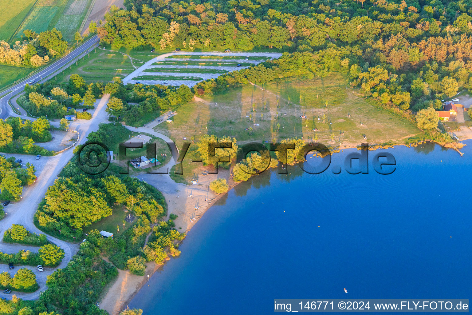 Deserted beach at Epplesee in cold May in the district Silberstreifen in Rheinstetten in the state Baden-Wuerttemberg, Germany