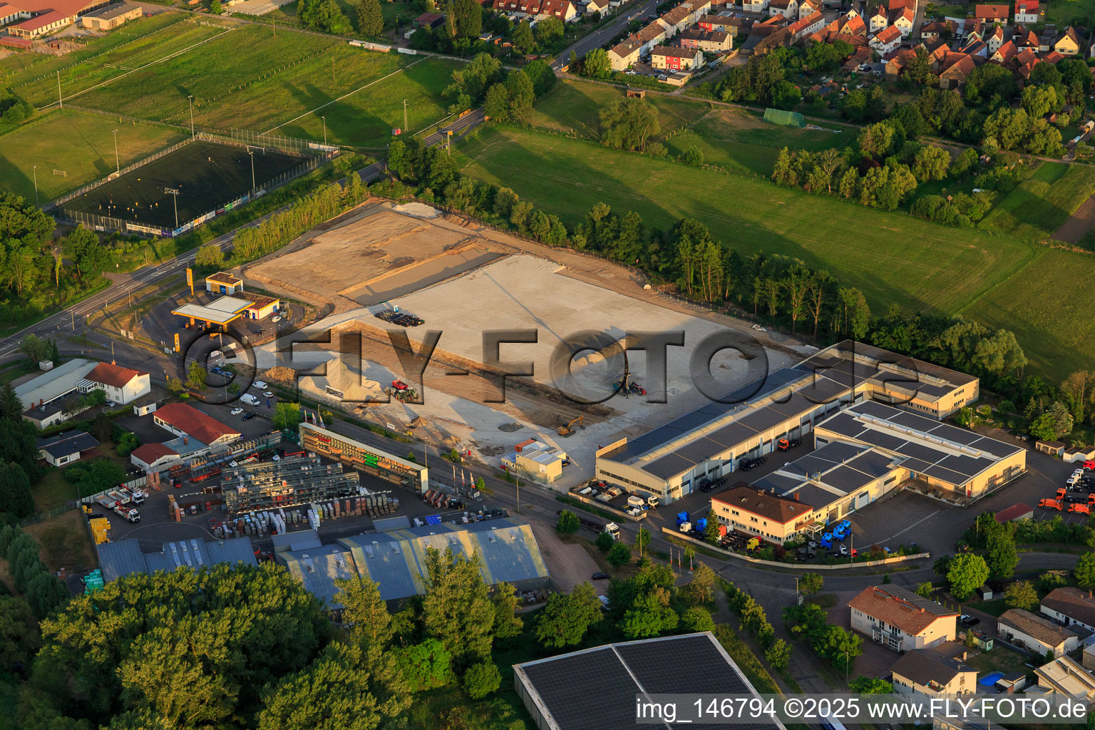 Aerial view of Construction site with foundation of the new logistics park of HANSAINVEST and DFI-Real-Estate Kandel after demolition of the OBI market in the district Minderslachen in Kandel in the state Rhineland-Palatinate, Germany