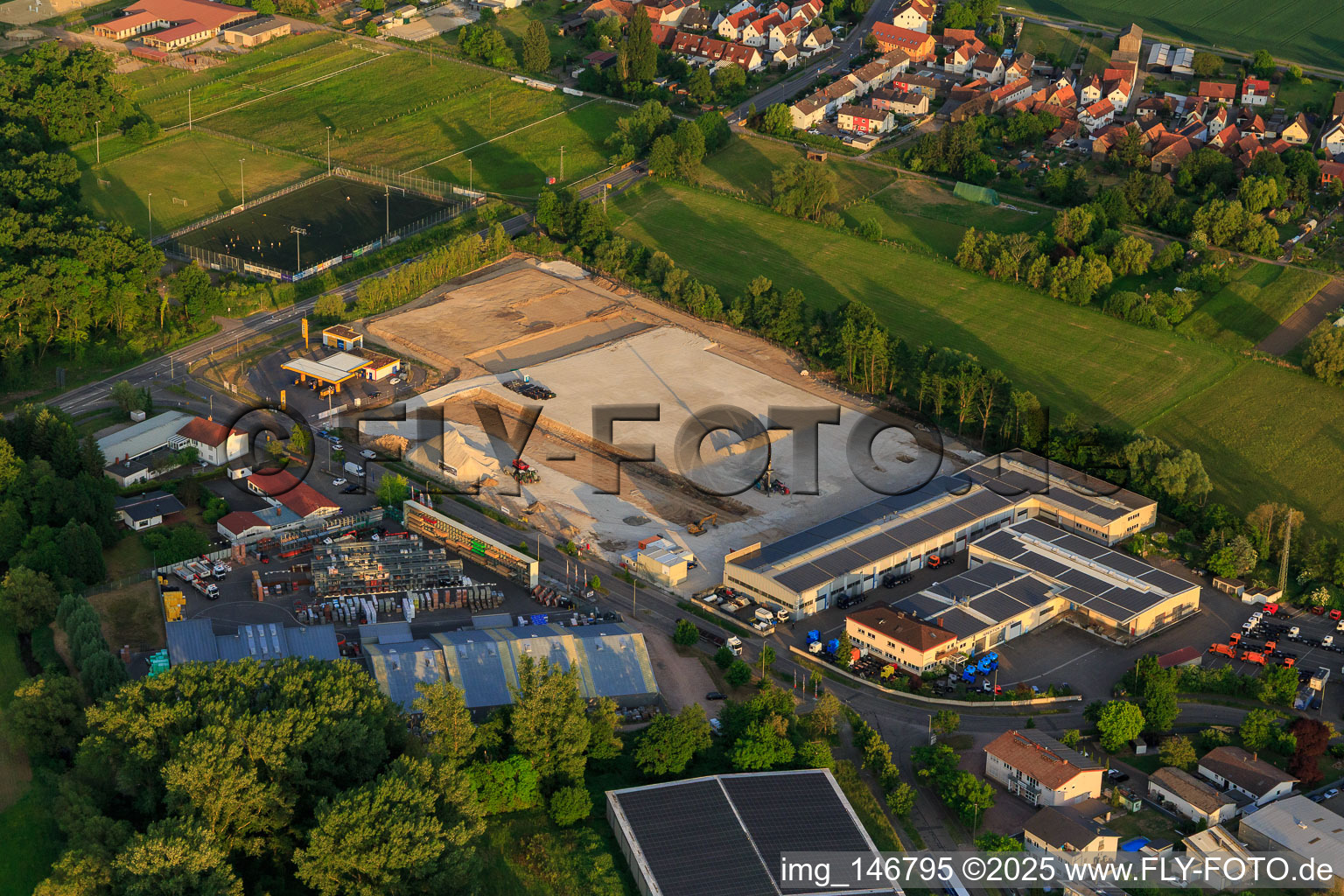Aerial photograpy of Construction site with foundation of the new logistics park of HANSAINVEST and DFI-Real-Estate Kandel after demolition of the OBI market in the district Minderslachen in Kandel in the state Rhineland-Palatinate, Germany