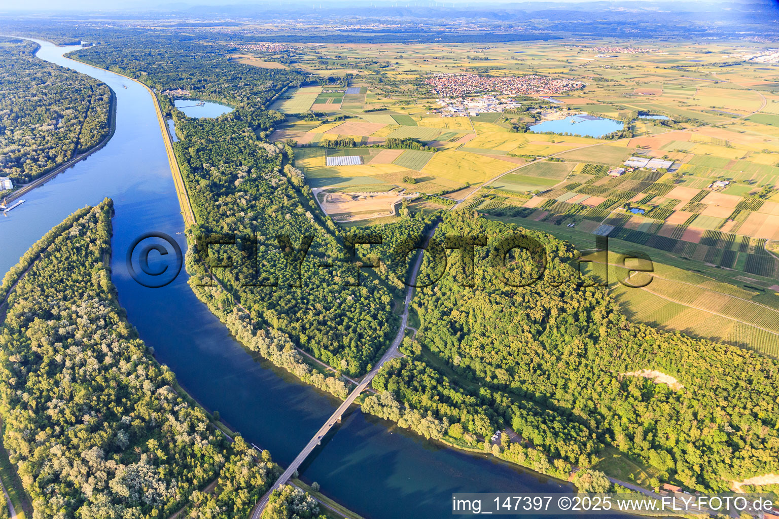 Rhine bridge and tip of the Rhine island between the canal and the Rhine in Sasbach am Kaiserstuhl in the state Baden-Wuerttemberg, Germany