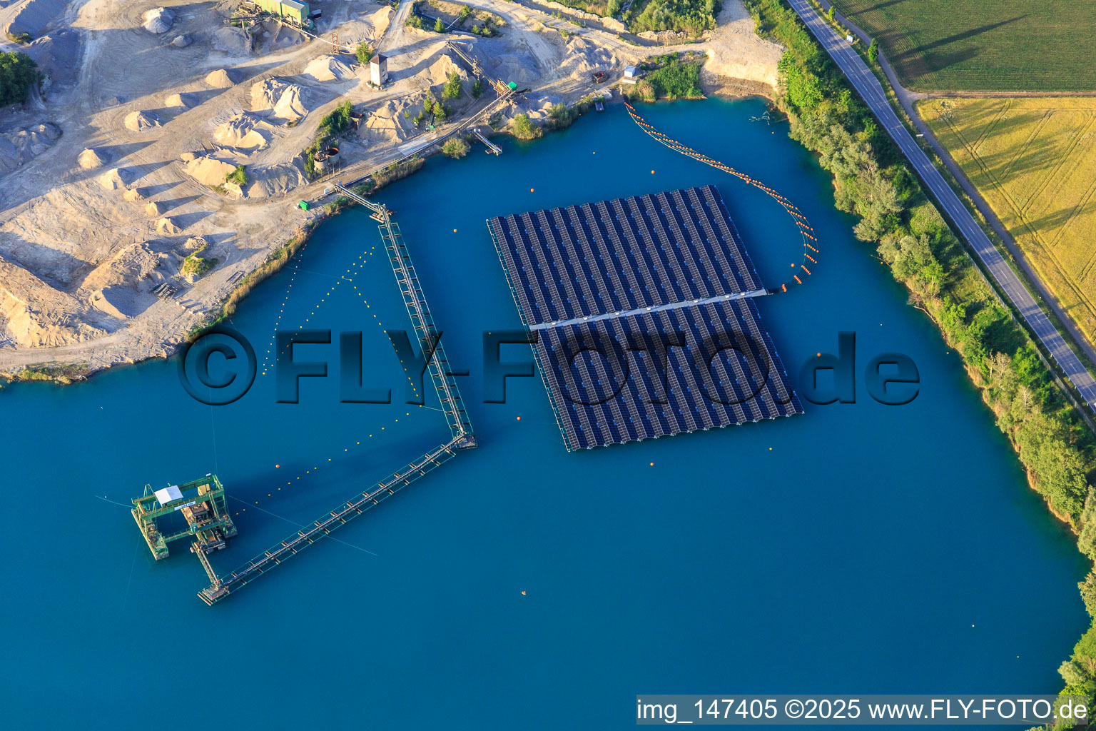 Wyhl gravel pit with floating PV system of Hermann Uhl KG - Wyhl-Ort plant in Wyhl am Kaiserstuhl in the state Baden-Wuerttemberg, Germany