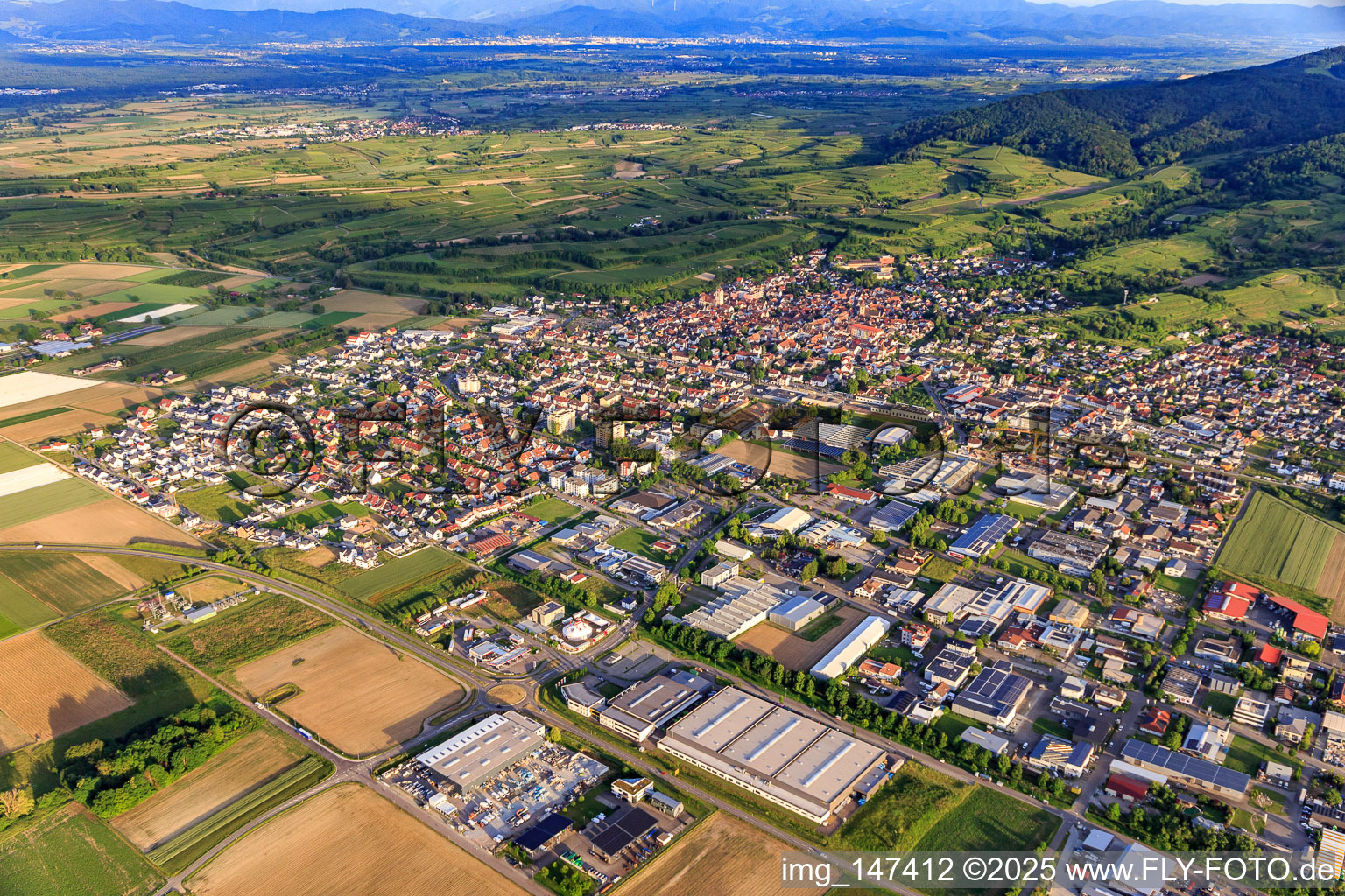 City overview from the northwest with Adval Tech (Germany) GmbH & Co. KG and Dinger Stone GmbH in Endingen am Kaiserstuhl in the state Baden-Wuerttemberg, Germany