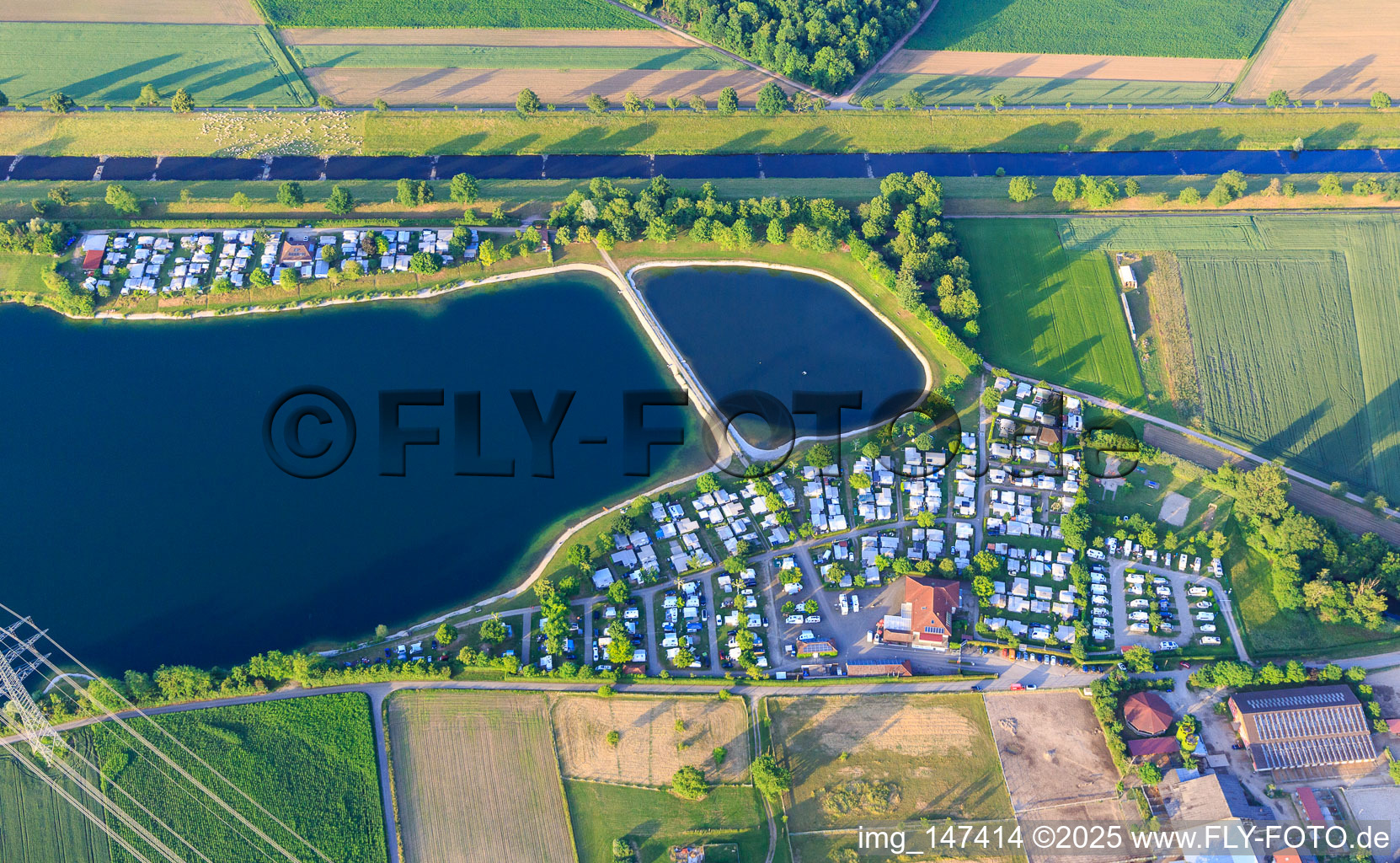 Müller-See Camping and Leisure GmbH and motorhome parking space Riegel am Kaiserstuhl at the nature reserve in the large bathing lake Riegel in Riegel am Kaiserstuhl in the state Baden-Wuerttemberg, Germany