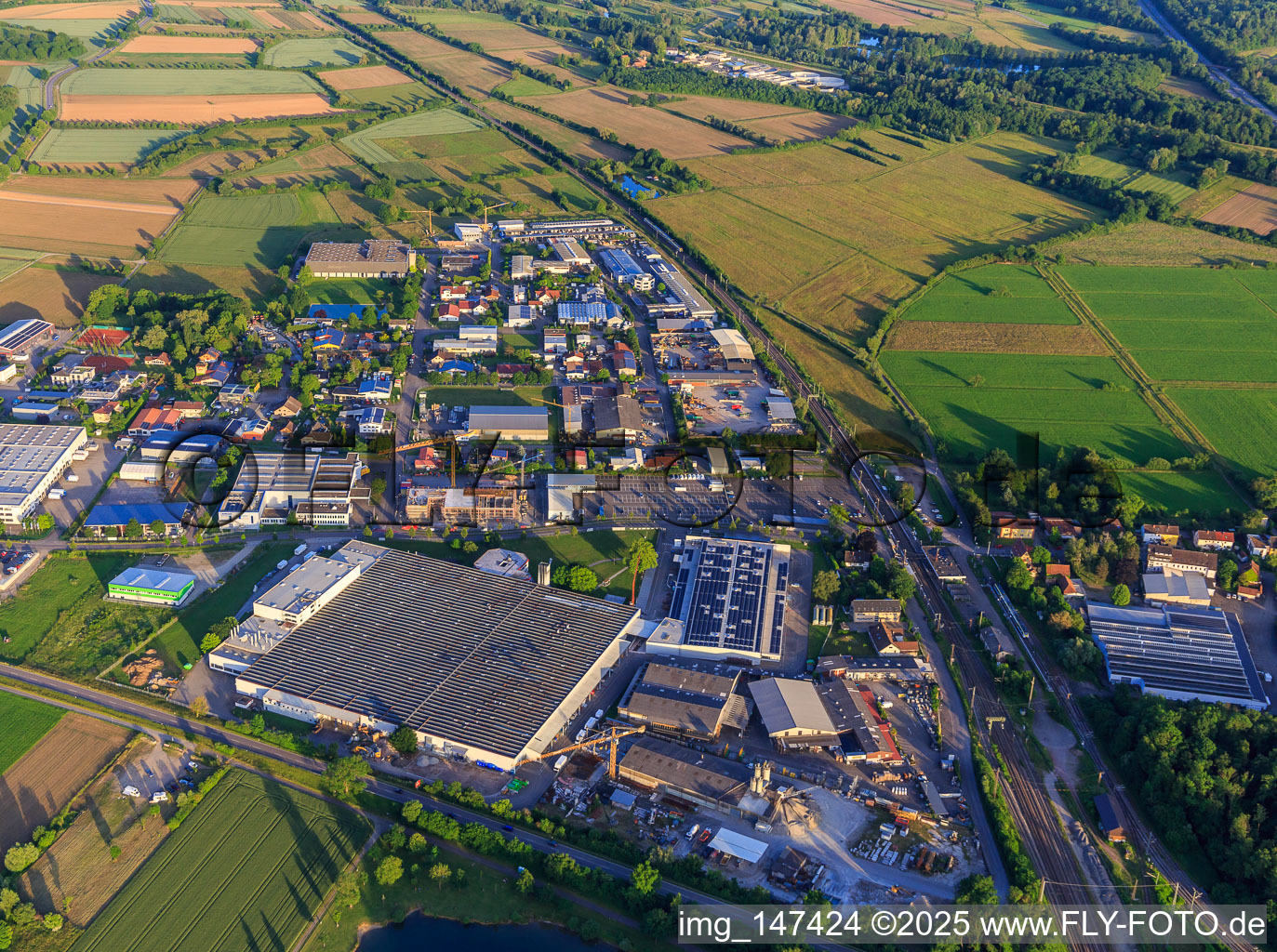 Aerial view of Gewerbestraße industrial area with Kemmler Baustoffhandel, Rhenus Data Office and Scheerer Logistik GmbH & Co. KG in Malterdingen in the state Baden-Wuerttemberg, Germany