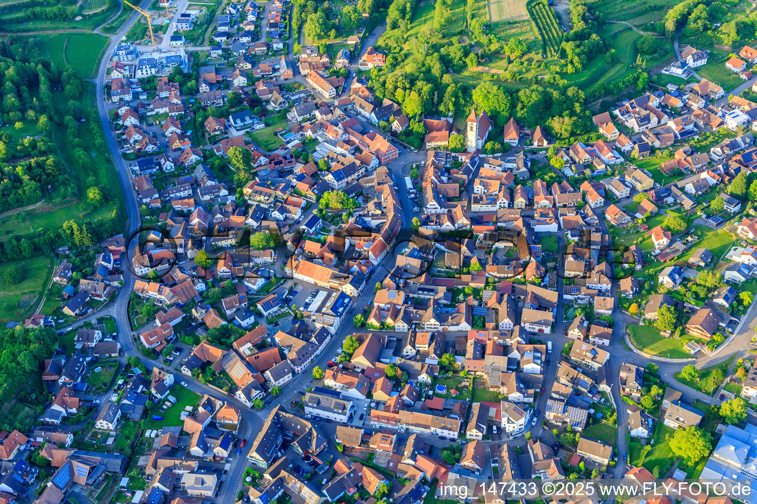 Main Street and Evangelical St. James' Church in Malterdingen in the state Baden-Wuerttemberg, Germany