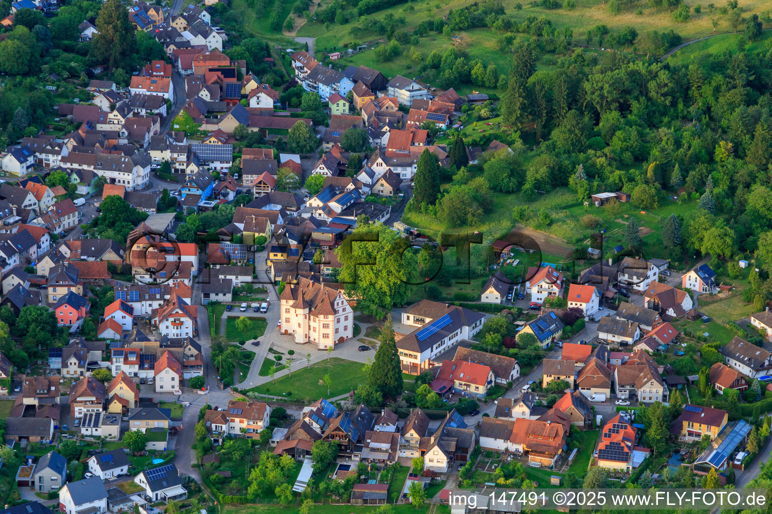 Oblique view of Village view from the southwest with Schmieheim Castle in the district Schmieheim in Kippenheim in the state Baden-Wuerttemberg, Germany