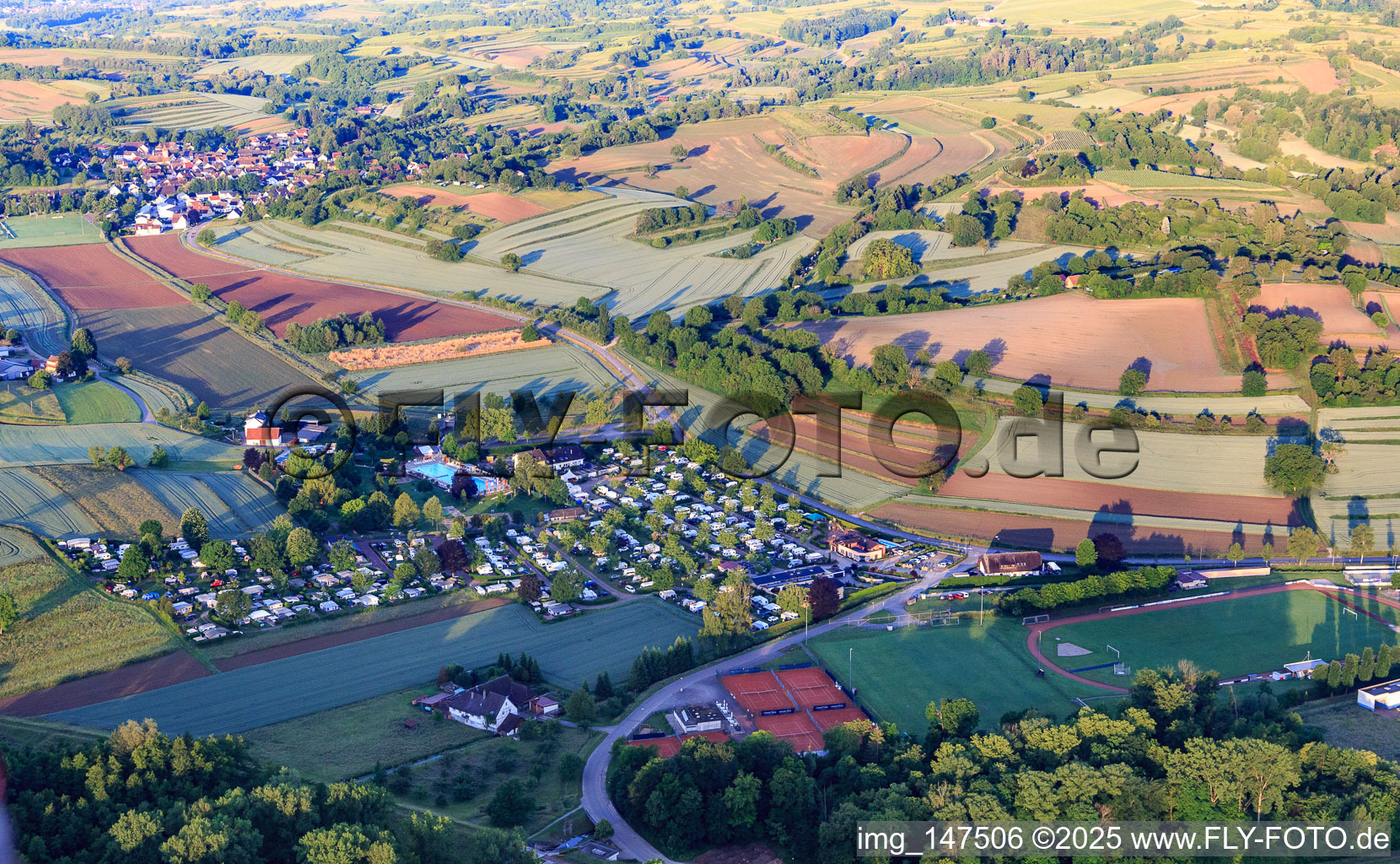 Aerial photograpy of Campingpark Oase at the Carl-Hermann-Jäger outdoor pool and tennis club Ettenheim eV in Ettenheim in the state Baden-Wuerttemberg, Germany