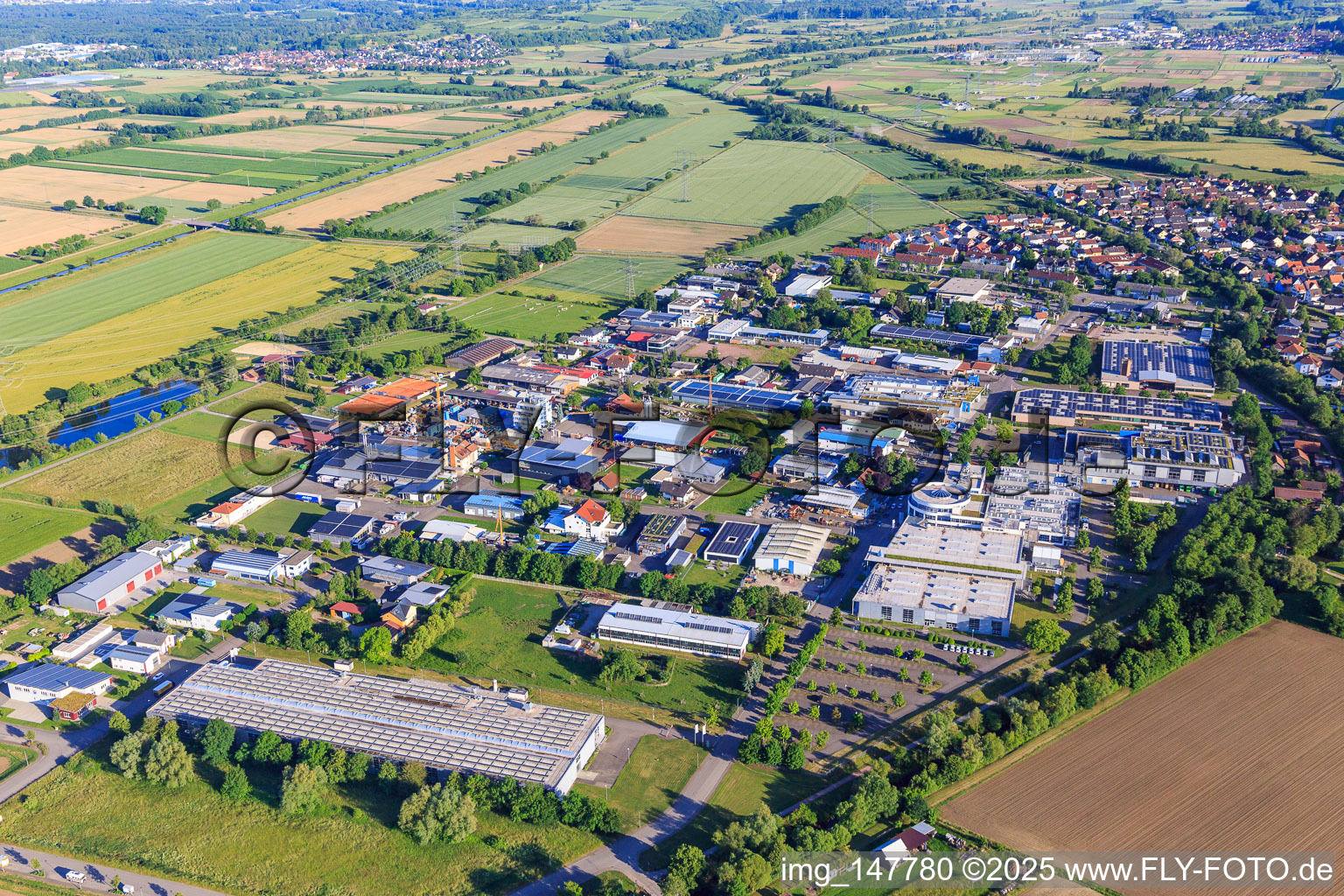 Industrial area on the old Dreisam with Otto Männer GmbH and Maier Küchen GmbH in Bahlingen am Kaiserstuhl in the state Baden-Wuerttemberg, Germany