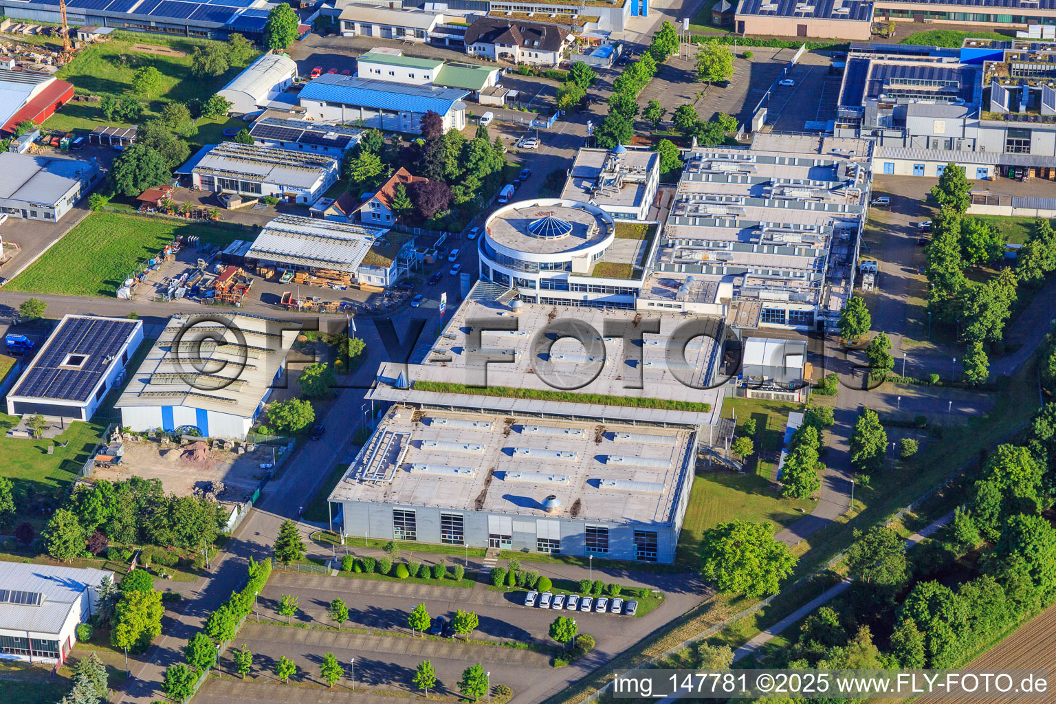Aerial view of Industrial area on the old Dreisam with Otto Männer GmbH and Maier Küchen GmbH in Bahlingen am Kaiserstuhl in the state Baden-Wuerttemberg, Germany