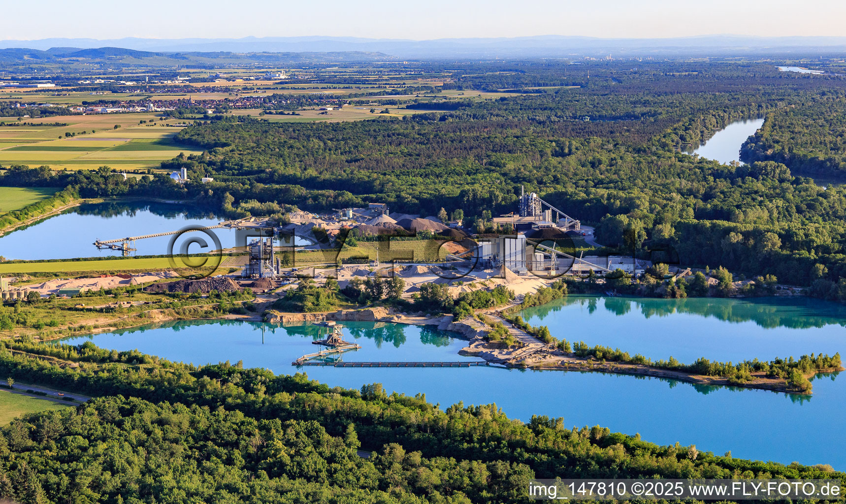 Gravel pit Oberrimsingen with BAW Breisgauer Asphalt-Mischwerk GmbH & Co. KG and Joos Gravel and Asphalt Plant in the district Oberrimsingen in Breisach am Rhein in the state Baden-Wuerttemberg, Germany