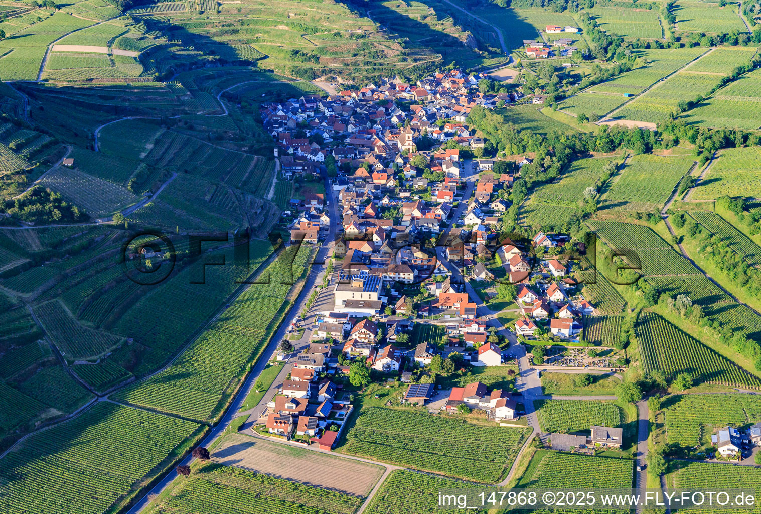 Aerial photograpy of Wine-growing village in the Kaiserstuhl from the southwest in the district Achkarren in Vogtsburg im Kaiserstuhl in the state Baden-Wuerttemberg, Germany