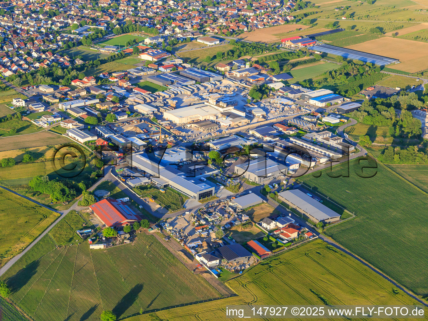 Tullastraße industrial area with BELLE AG, HBW5 DSHT and Lithonplus GmbH & Co. KG in Wyhl am Kaiserstuhl in the state Baden-Wuerttemberg, Germany