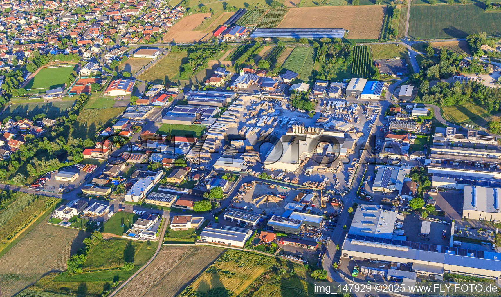 Aerial view of Tullastraße industrial area with BELLE AG, HBW5 DSHT and Lithonplus GmbH & Co. KG in Wyhl am Kaiserstuhl in the state Baden-Wuerttemberg, Germany