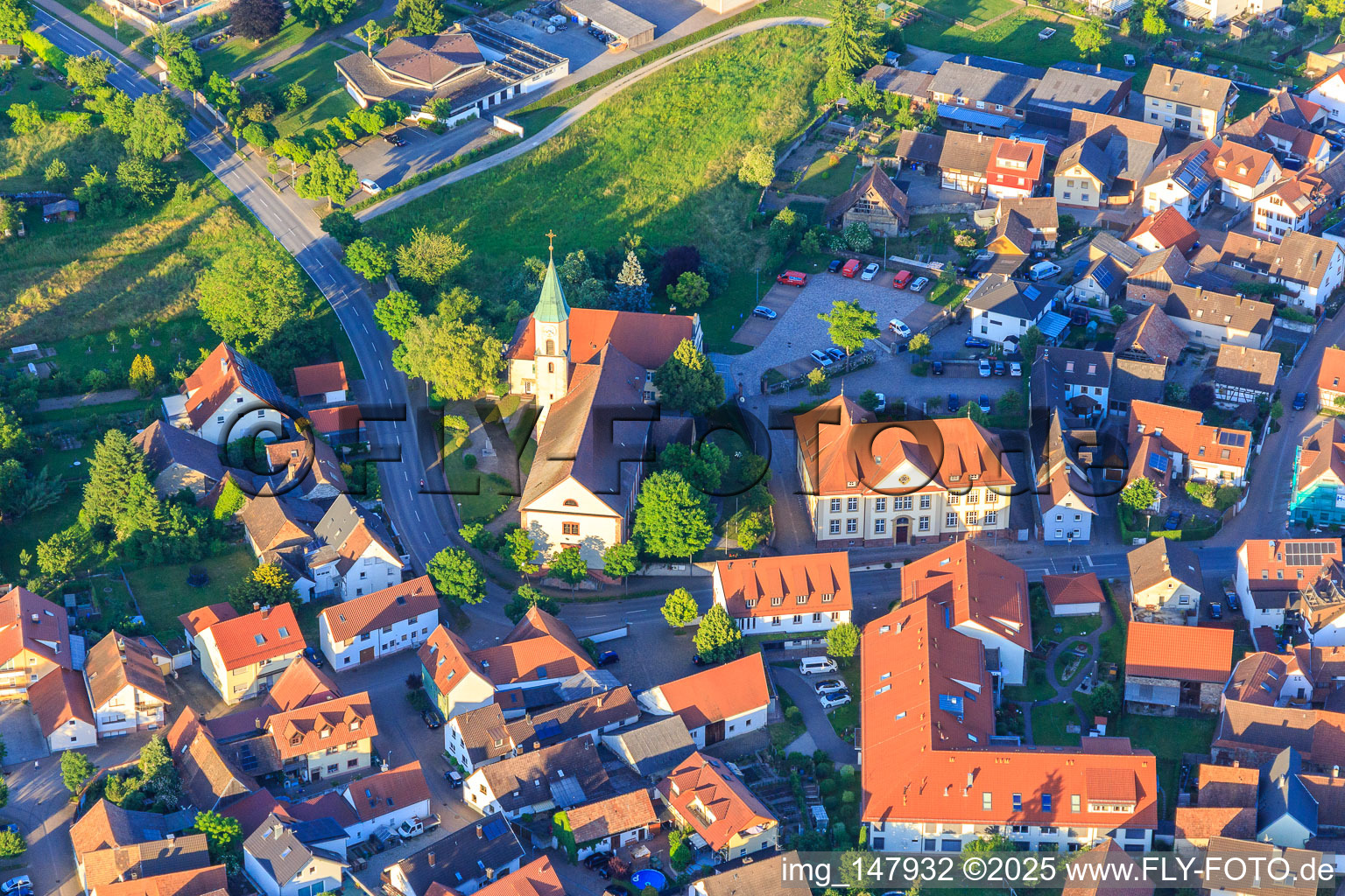 St. Blasius Church and BeneVit Haus Rheinaue nursing home in Wyhl am Kaiserstuhl in the state Baden-Wuerttemberg, Germany