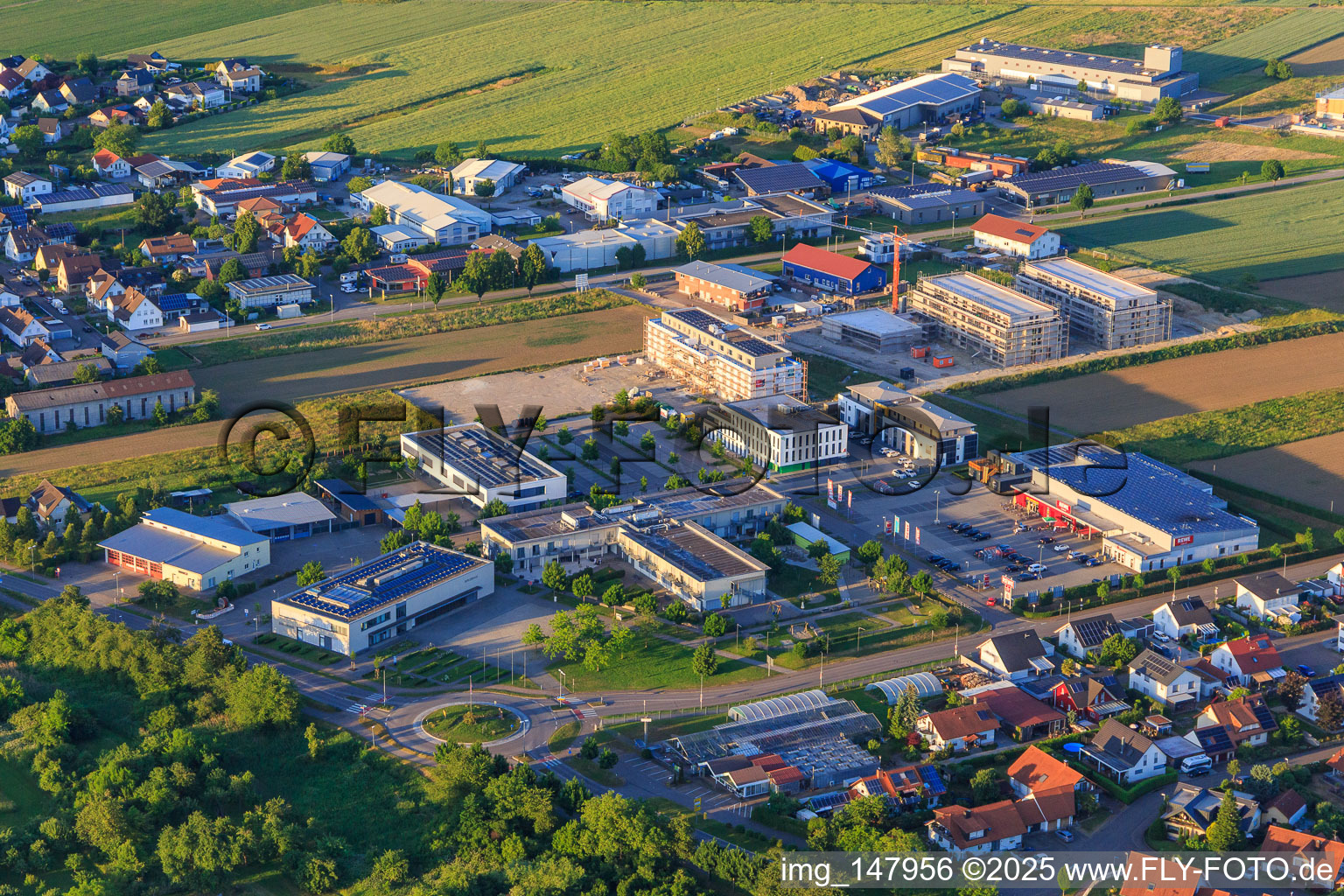 Commercial area with community center Rheinhausen, care in the Generationshaus St. Josef | The Sisters' Association and REWE in the district Oberhausen in Rheinhausen in the state Baden-Wuerttemberg, Germany