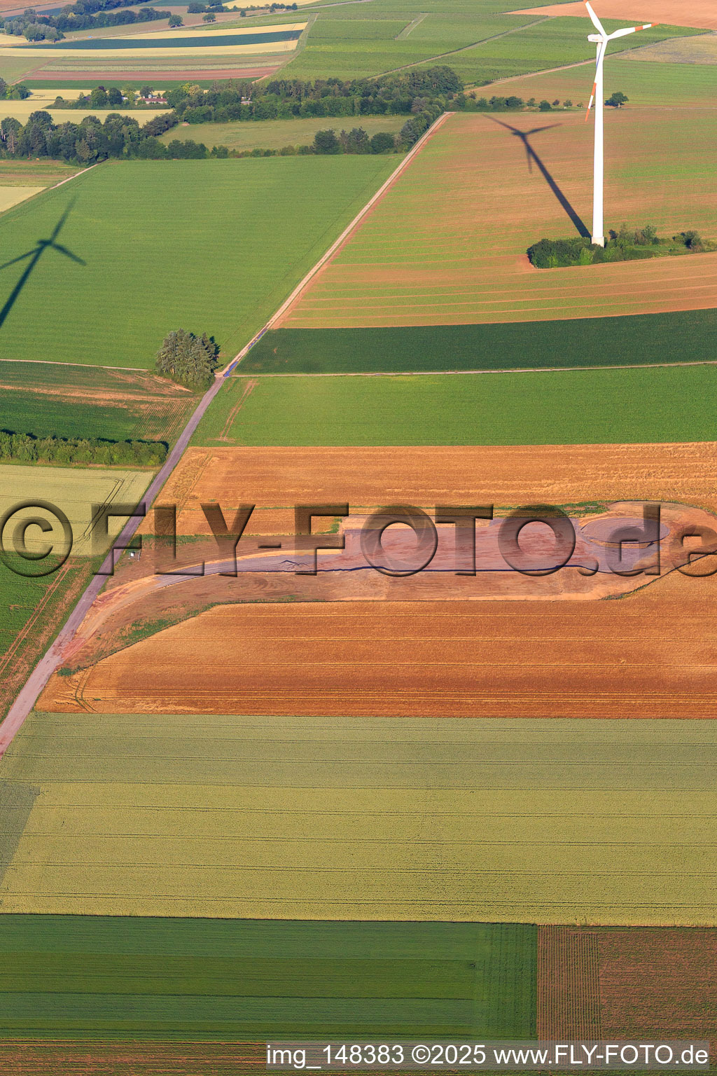 Aerial view of Repowering Wind Farm Minfeld. JUWI replaces four old turbines (GE 1.5) from 2004 with two new, modern Vestas V162 turbines, each with six megawatts. in Minfeld in the state Rhineland-Palatinate, Germany
