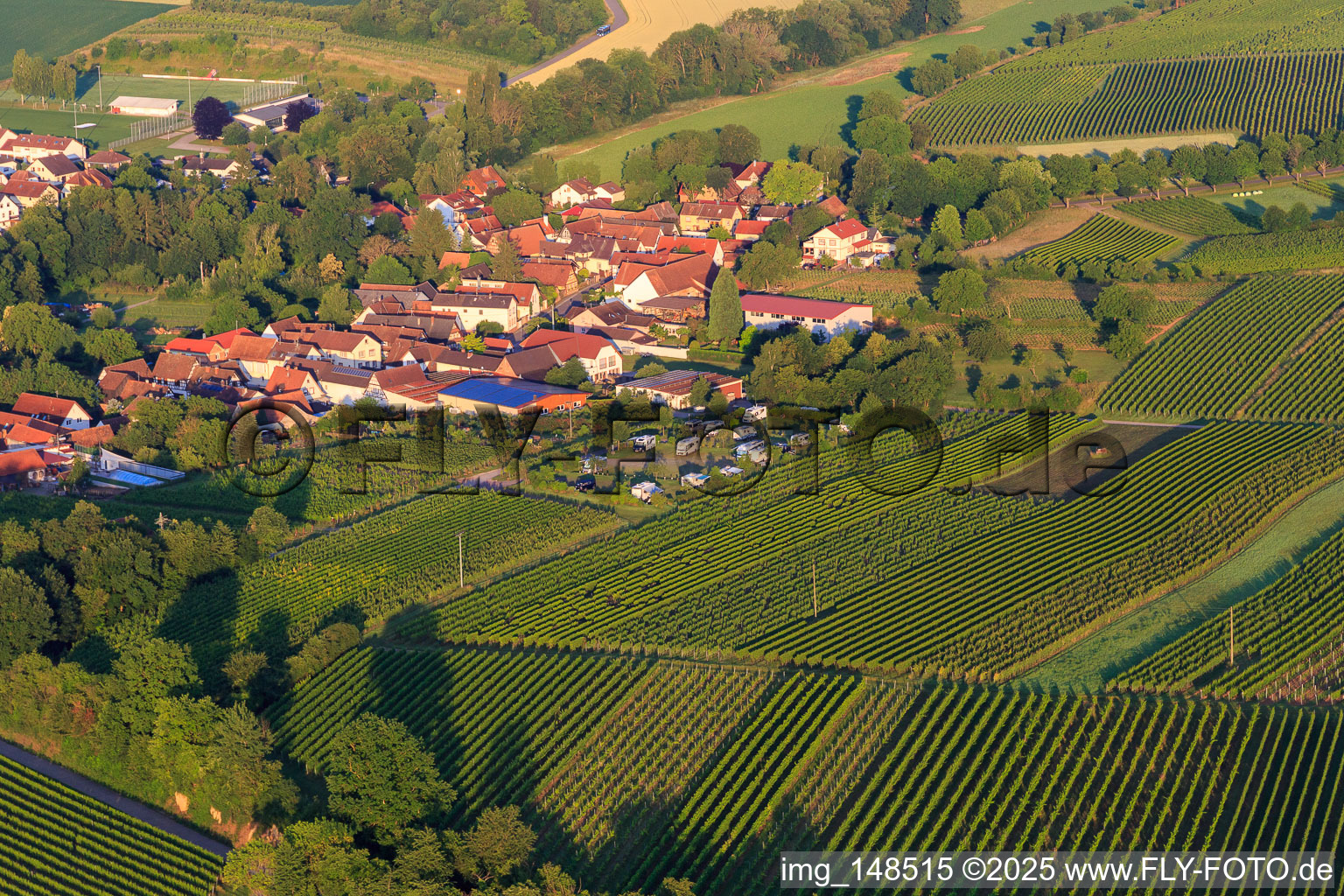 Village view in the morning from the north with the mobile home parking area of Weinhaus Geiger in Dierbach in the state Rhineland-Palatinate, Germany