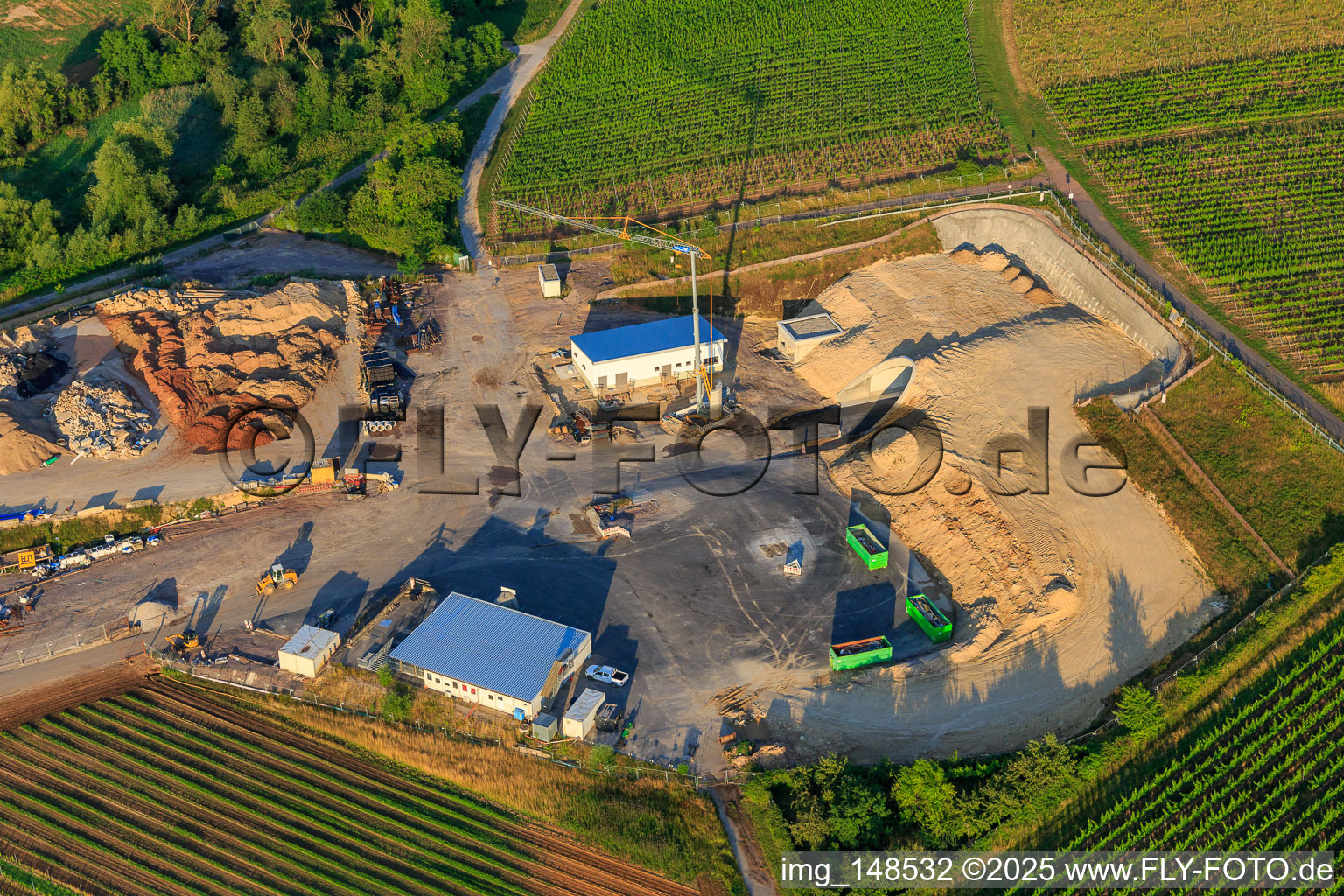 Construction site of the eastern tunnel portal for the Astrid Tunnel for the underpass and bypass of Bad Bergzabern between B38 (Weinstraße) and B427 (Kurtalstraße) in Dörrenbach in the state Rhineland-Palatinate, Germany from the drone perspective