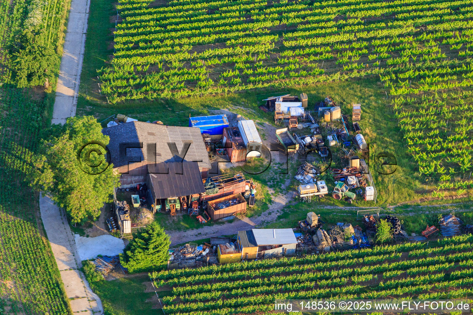 Aerial view of Hut with a yard full of junk and junk in Dörrenbach in the state Rhineland-Palatinate, Germany
