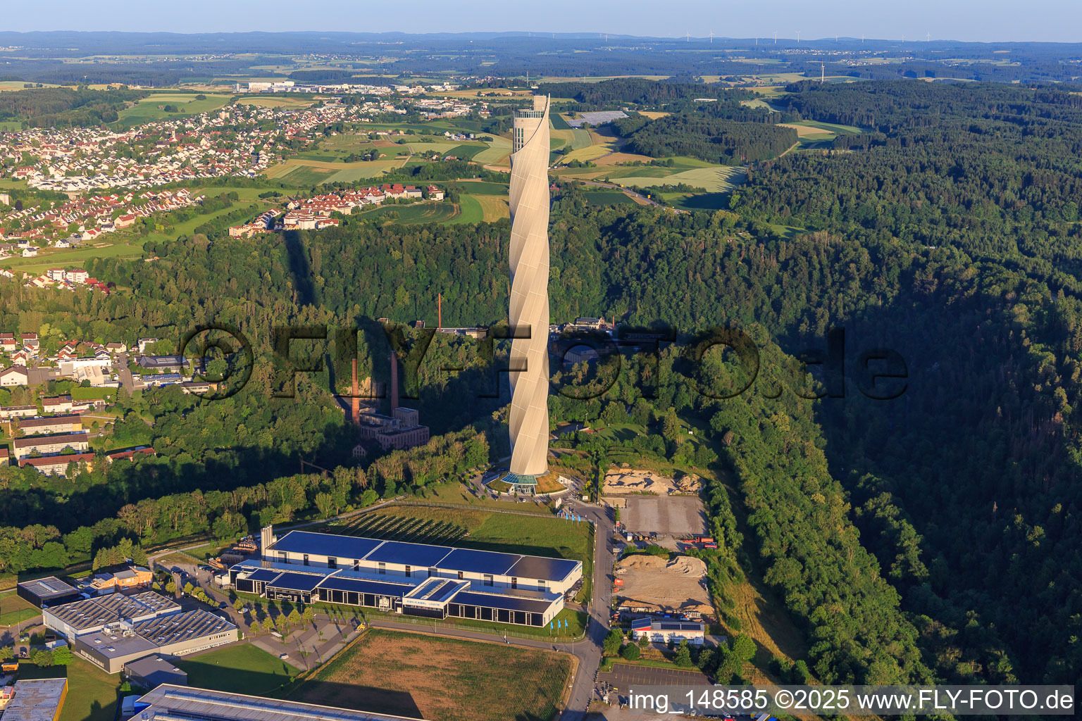 TK Elevator Test Tower: Elevator test tower with twisted facade membrane, 12 elevator shafts and observation terrace with panoramic view and XBK-KABEL logistics center in Rottweil in the state Baden-Wuerttemberg, Germany