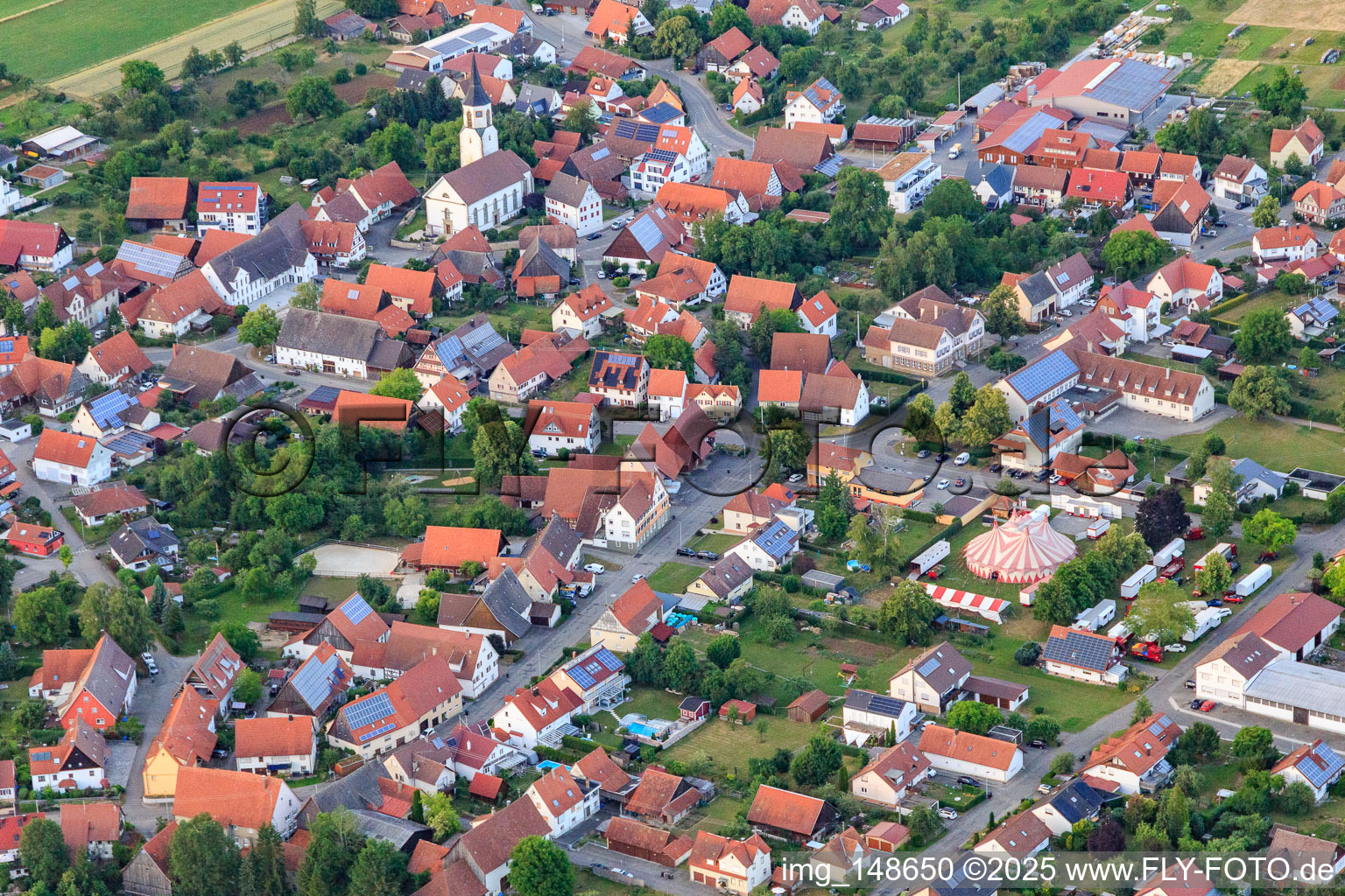 Village view from the southwest with circus tent in the district Ostdorf in Balingen in the state Baden-Wuerttemberg, Germany