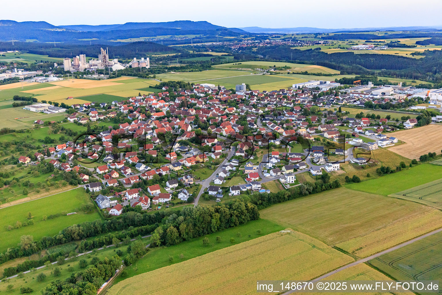 Village view from the north in front of the Dotternhausen quarry of BEDO Betonwerk Dotternhausen GmbH & Co. KG in Dormettingen in the state Baden-Wuerttemberg, Germany
