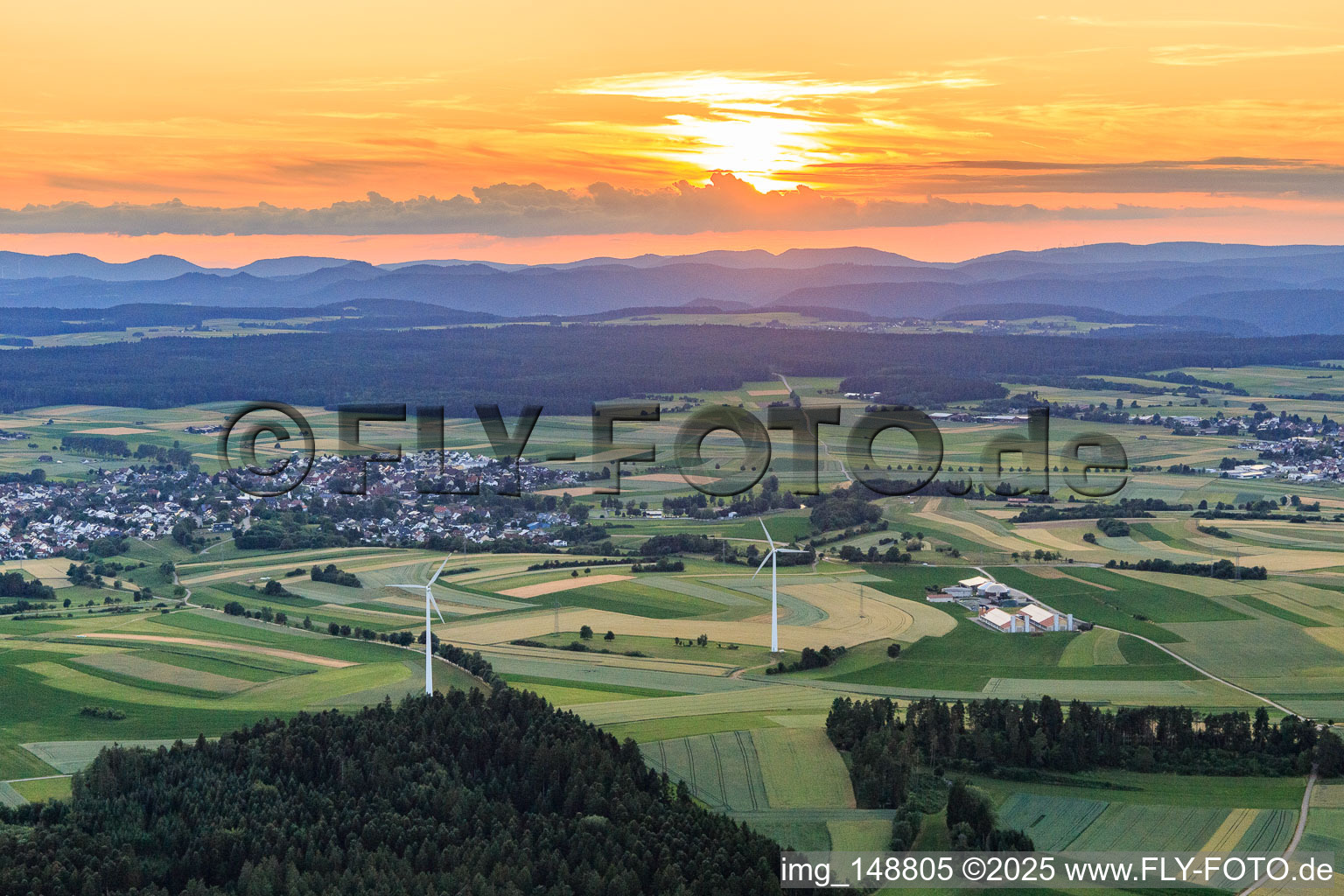 Sunset over the Black Forest with wind turbines in the district Waldmössingen in Schramberg in the state Baden-Wuerttemberg, Germany