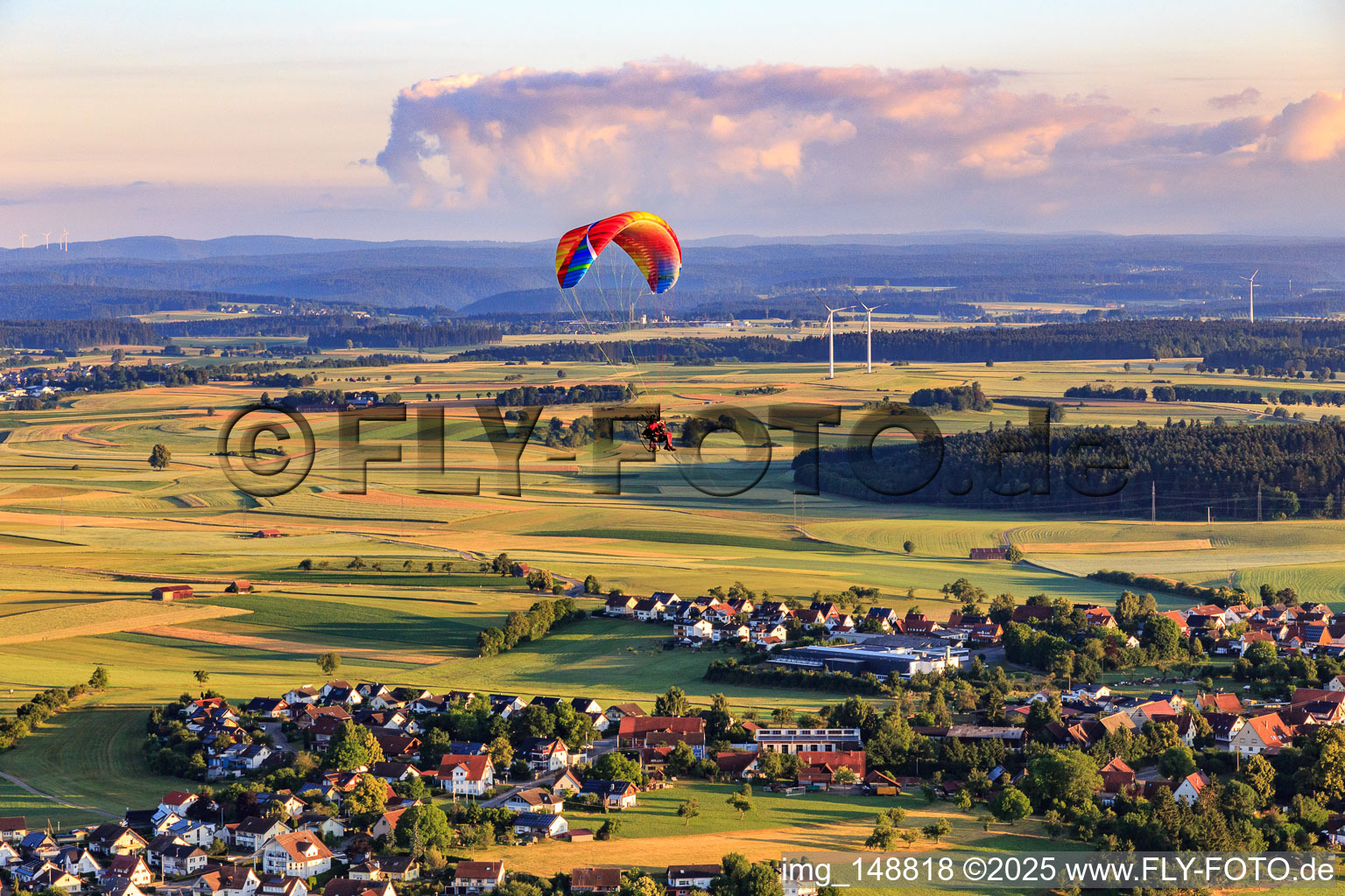 Village view with paraglider in the district Beffendorf in Oberndorf am Neckar in the state Baden-Wuerttemberg, Germany