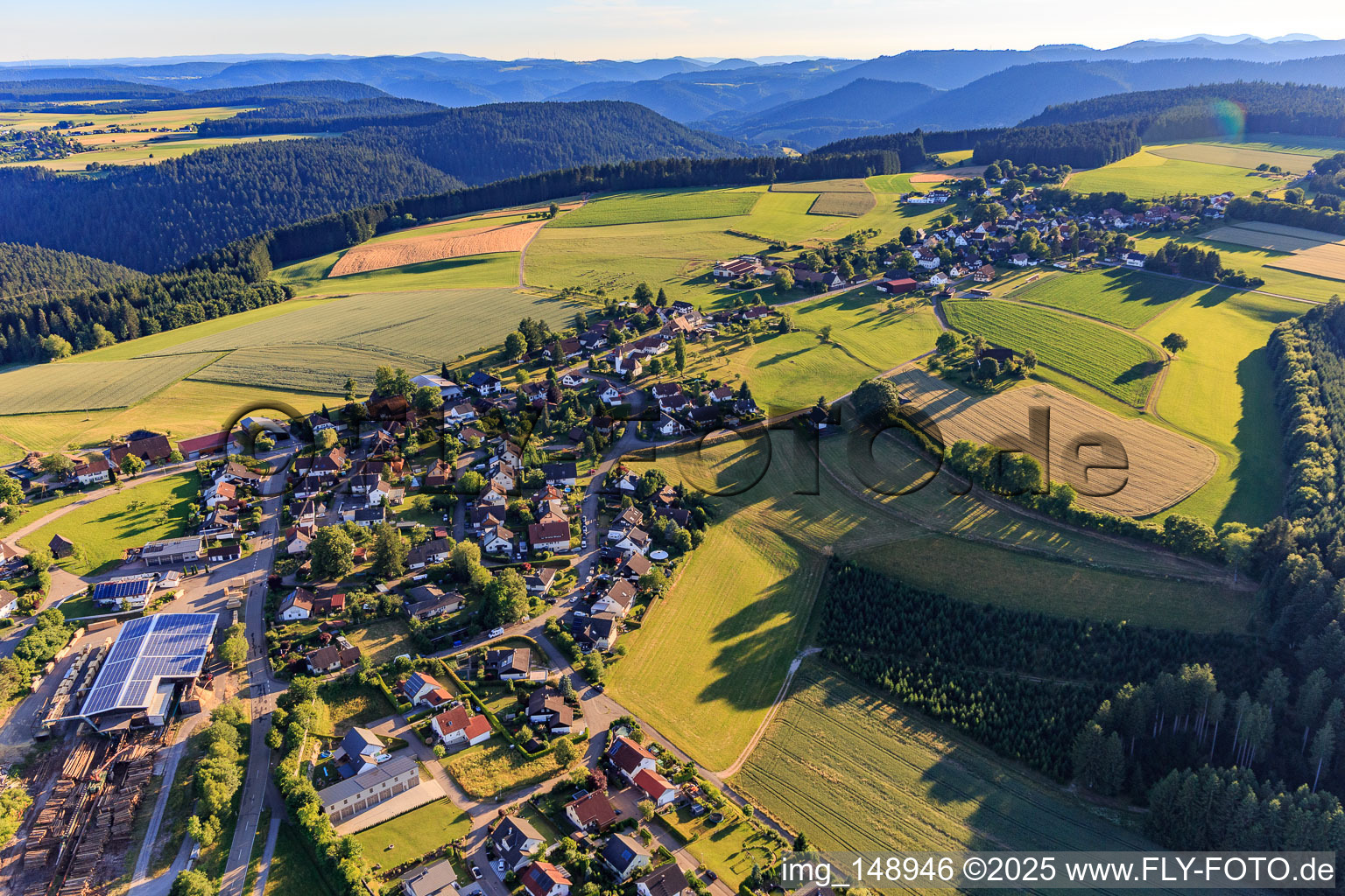 Village view from the northeast with Holzwerk Finkbeiner GmbH & Co in the district Reutin in Alpirsbach in the state Baden-Wuerttemberg, Germany