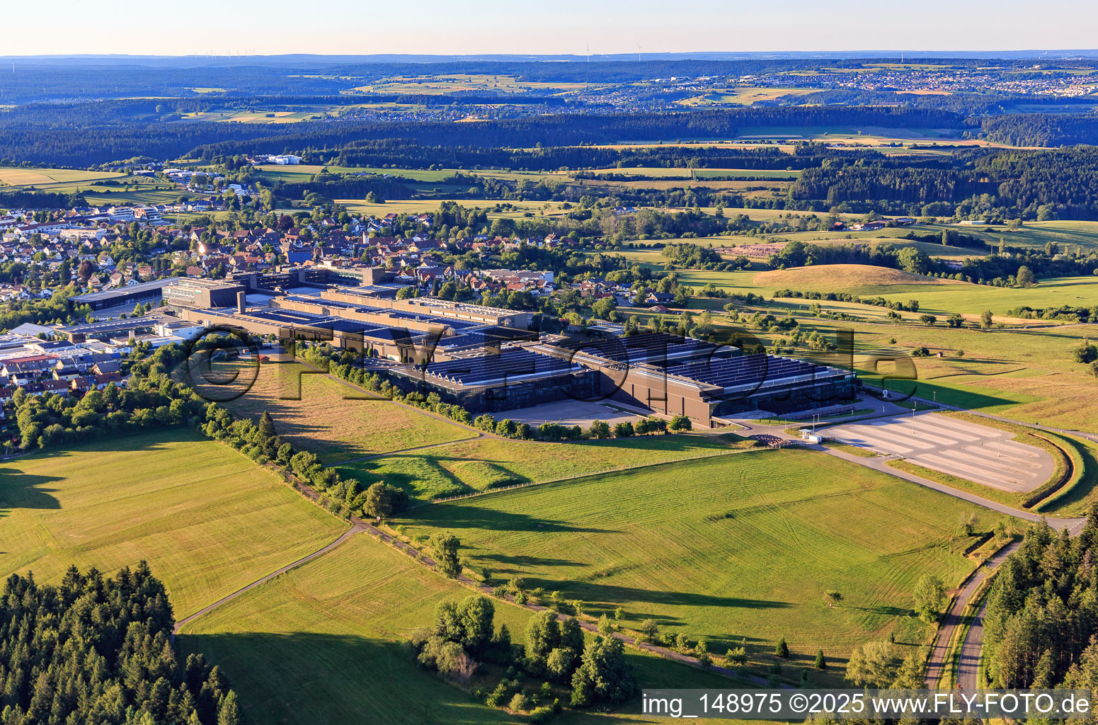 Aerial view of Company premises of ARBURG GmbH + Co KG from the southwest in Loßburg in the state Baden-Wuerttemberg, Germany