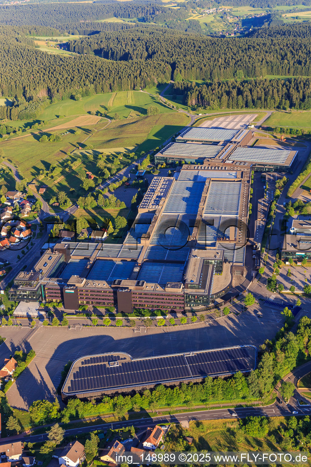 Aerial view of Company premises of ARBURG GmbH + Co KG from Norden in Loßburg in the state Baden-Wuerttemberg, Germany
