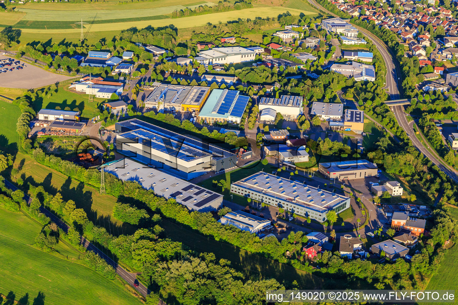 Aerial view of Industrial area Lise-Meitner-Straße with Sülzle Stahlpartner GmbH, printing company ITW Morlock GmbH, and Schwarz Systems GmbH location 02 in Dornstetten in the state Baden-Wuerttemberg, Germany