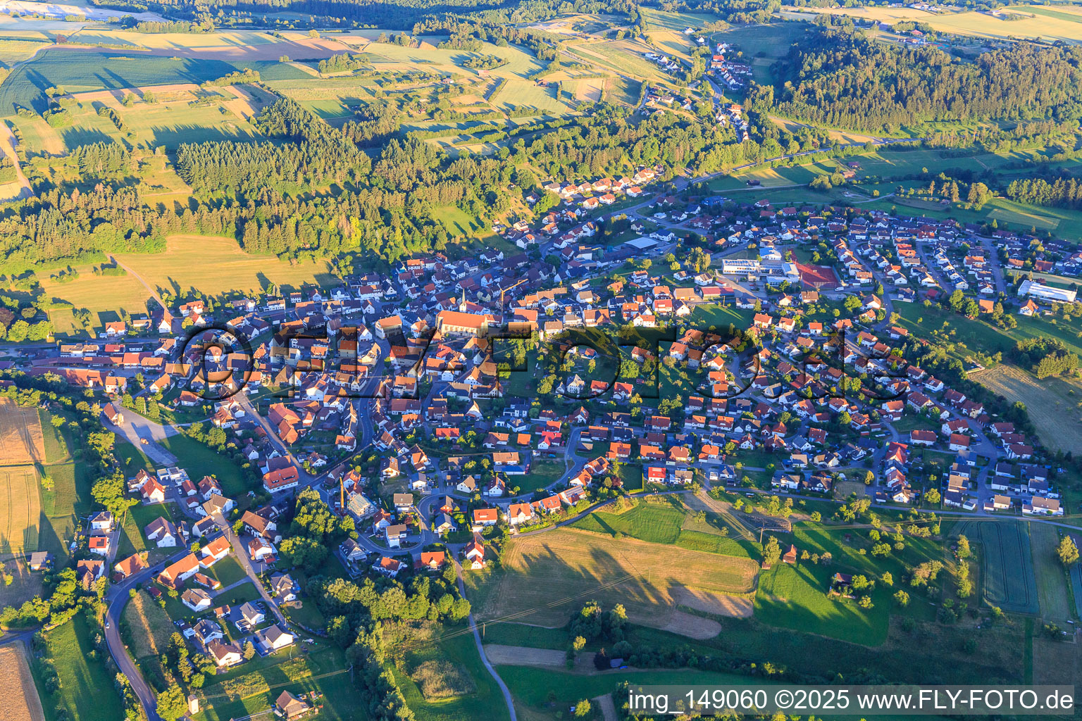 Village overview from the northwest with Church of the Nativity of Mary in the district Altheim in Horb am Neckar in the state Baden-Wuerttemberg, Germany