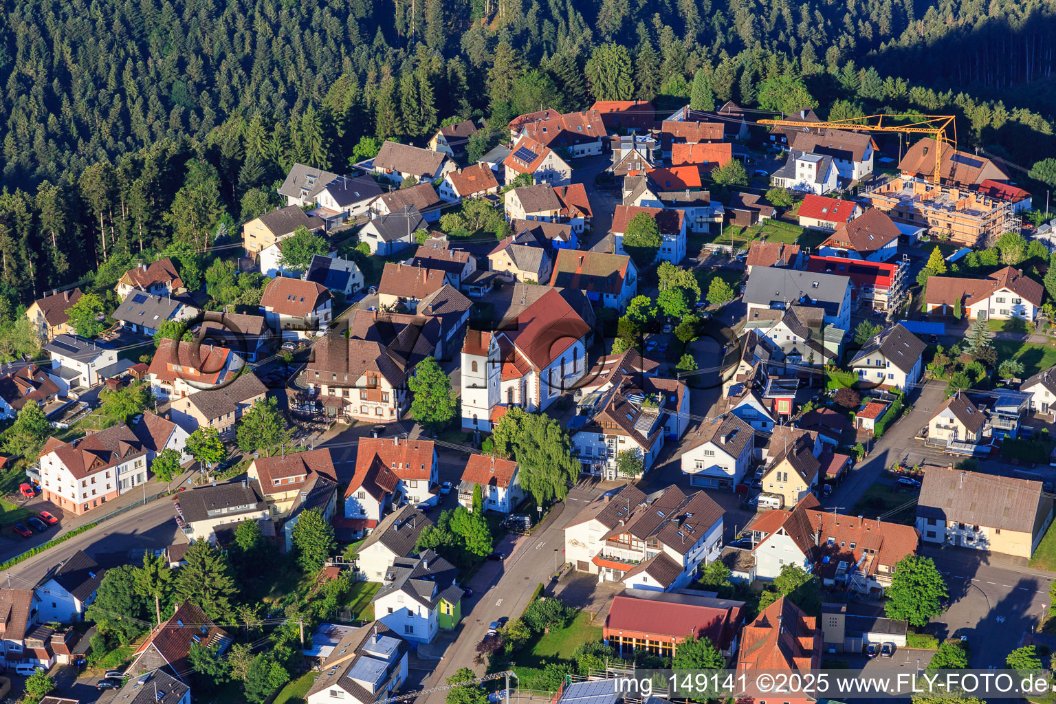 View of the town from the east with St. Michael's Church in the district Vorderaichhalden in Aichhalden in the state Baden-Wuerttemberg, Germany