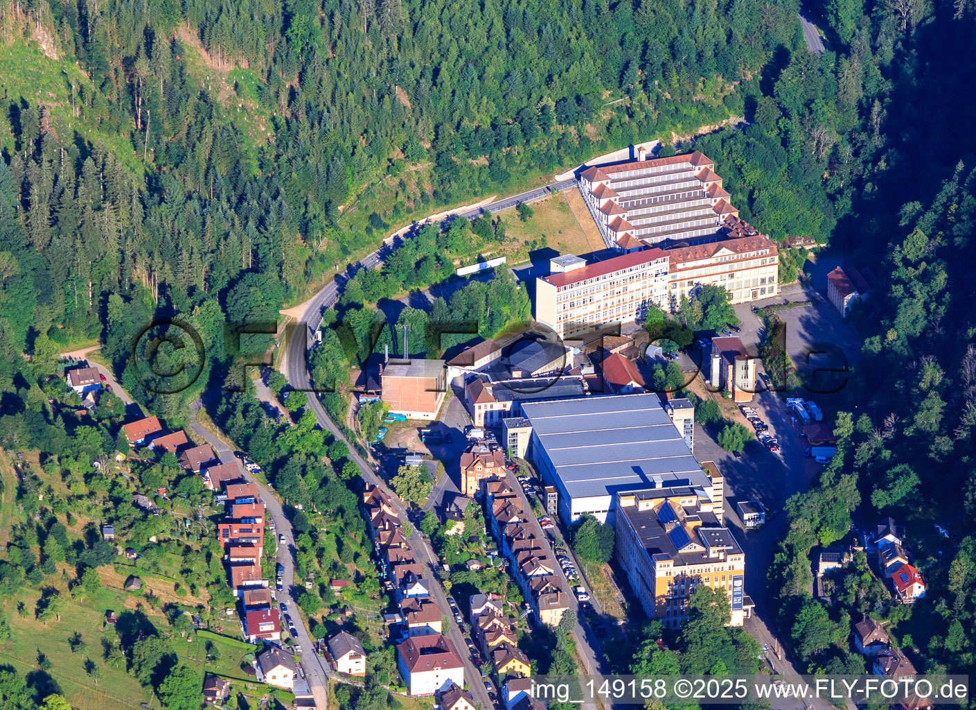 Aerial view of Lauterbachtal with Hansgrohe SE InnoLab Alpirsbach and Junghans Terrace Construction Museum in Schramberg in the state Baden-Wuerttemberg, Germany