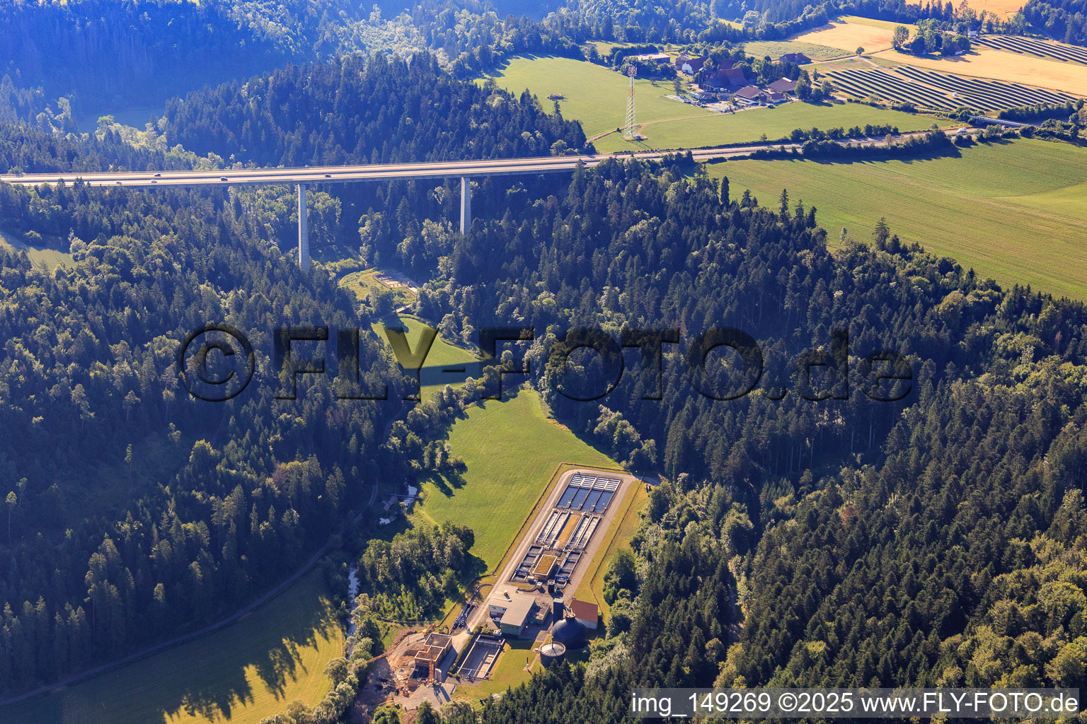 Motorway bridge of the A81 over the Eschachtal with central wastewater treatment plant in the district Horgen in Zimmern ob Rottweil in the state Baden-Wuerttemberg, Germany