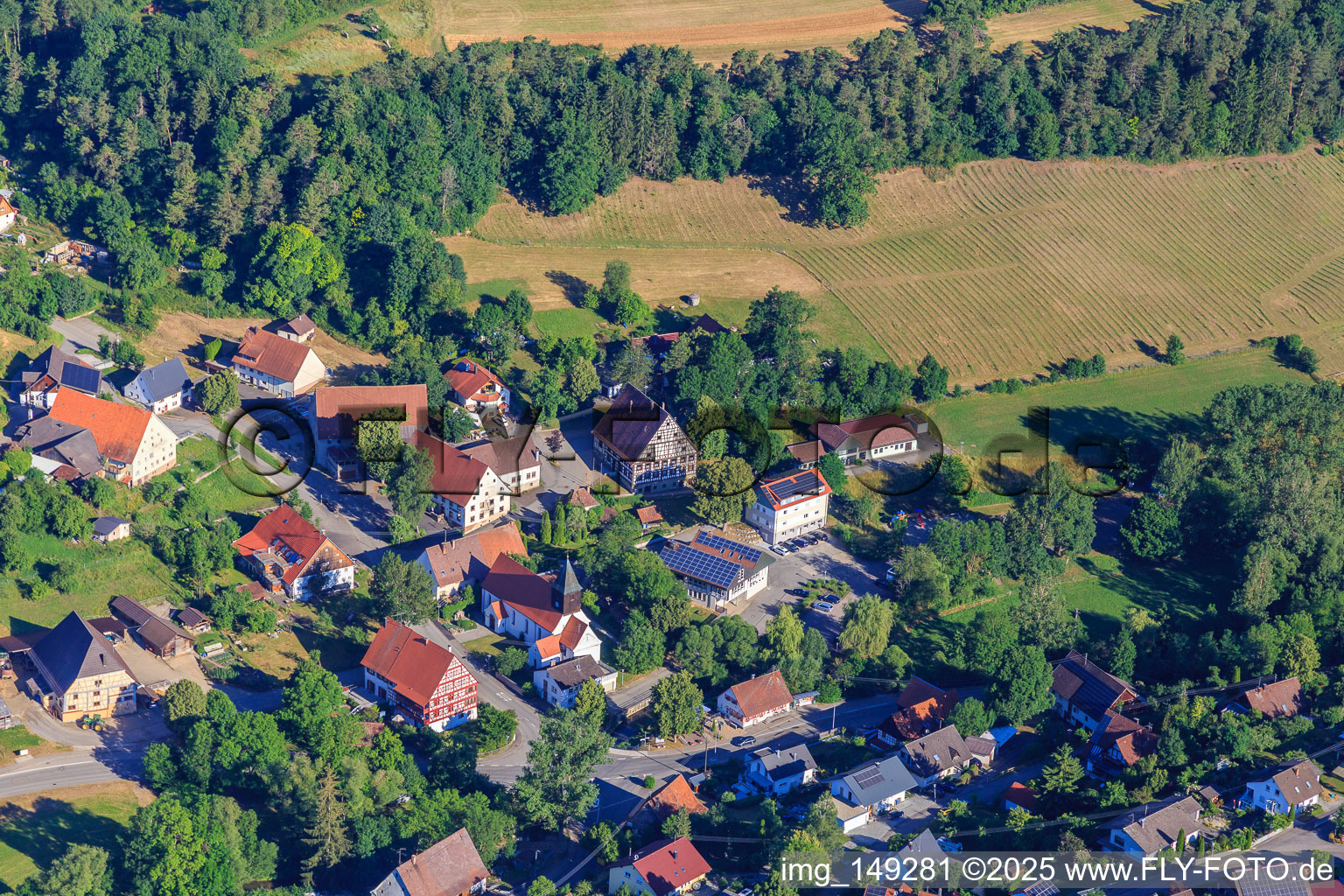 Rathausgasse with half-timbered town hall and church of St. Leodegar in the district Stetten in Zimmern ob Rottweil in the state Baden-Wuerttemberg, Germany