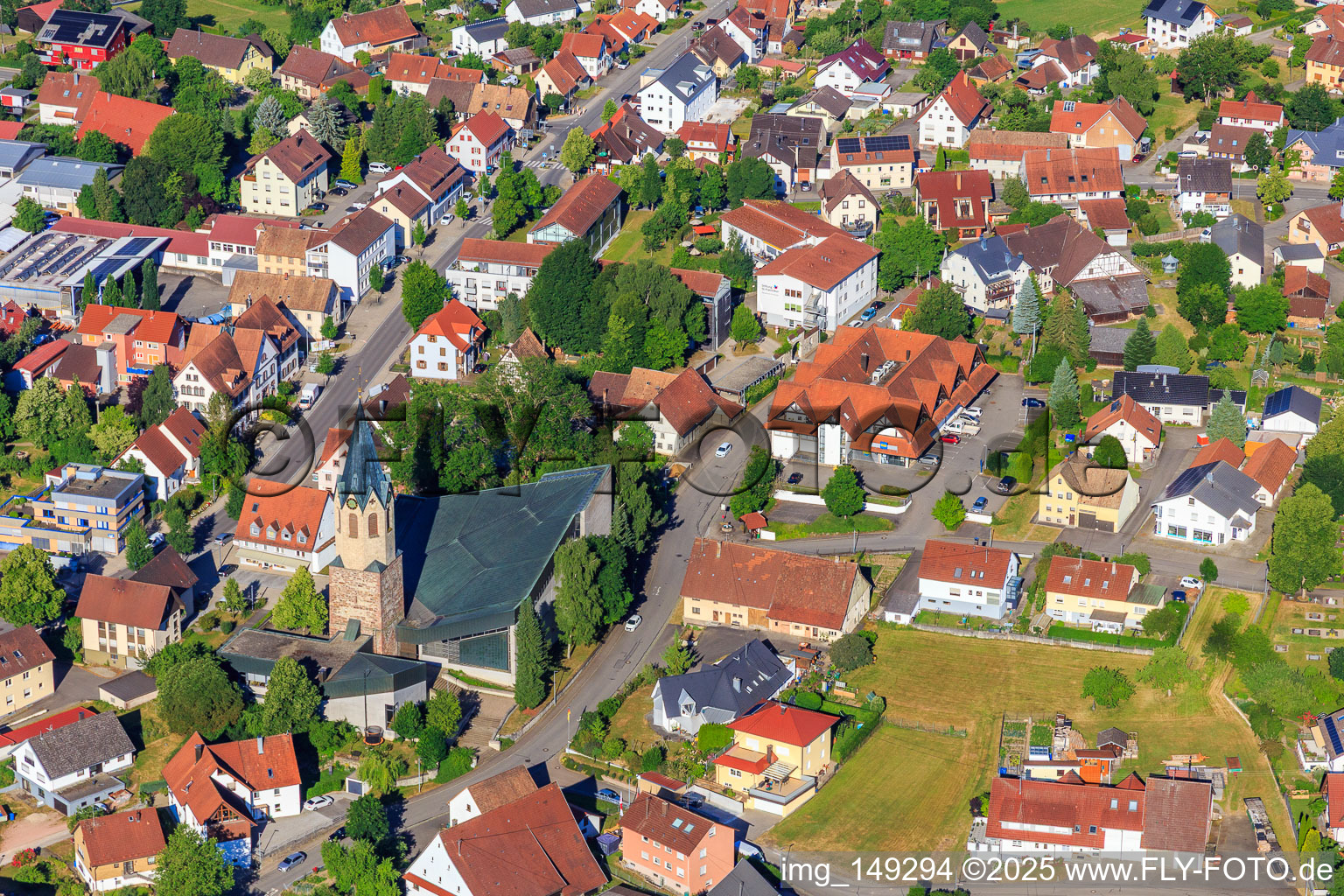 Aerial photograpy of Town center with St. Martinus Church, Wehle sports hall and Volksbank Schwarzwald-Donau-Neckar eG in Dunningen in the state Baden-Wuerttemberg, Germany