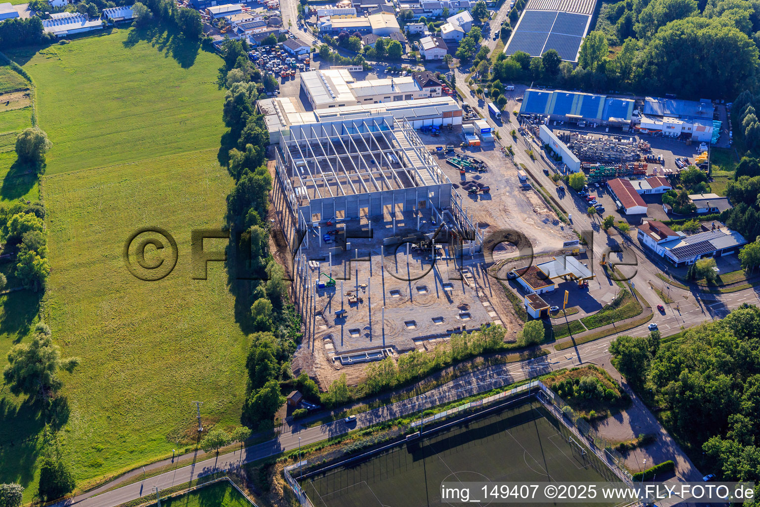 Construction site of the new logistics park of HANSAINVEST and DFI-Real-Estate Kandel after demolition of the OBI market in the district Minderslachen in Kandel in the state Rhineland-Palatinate, Germany from the plane