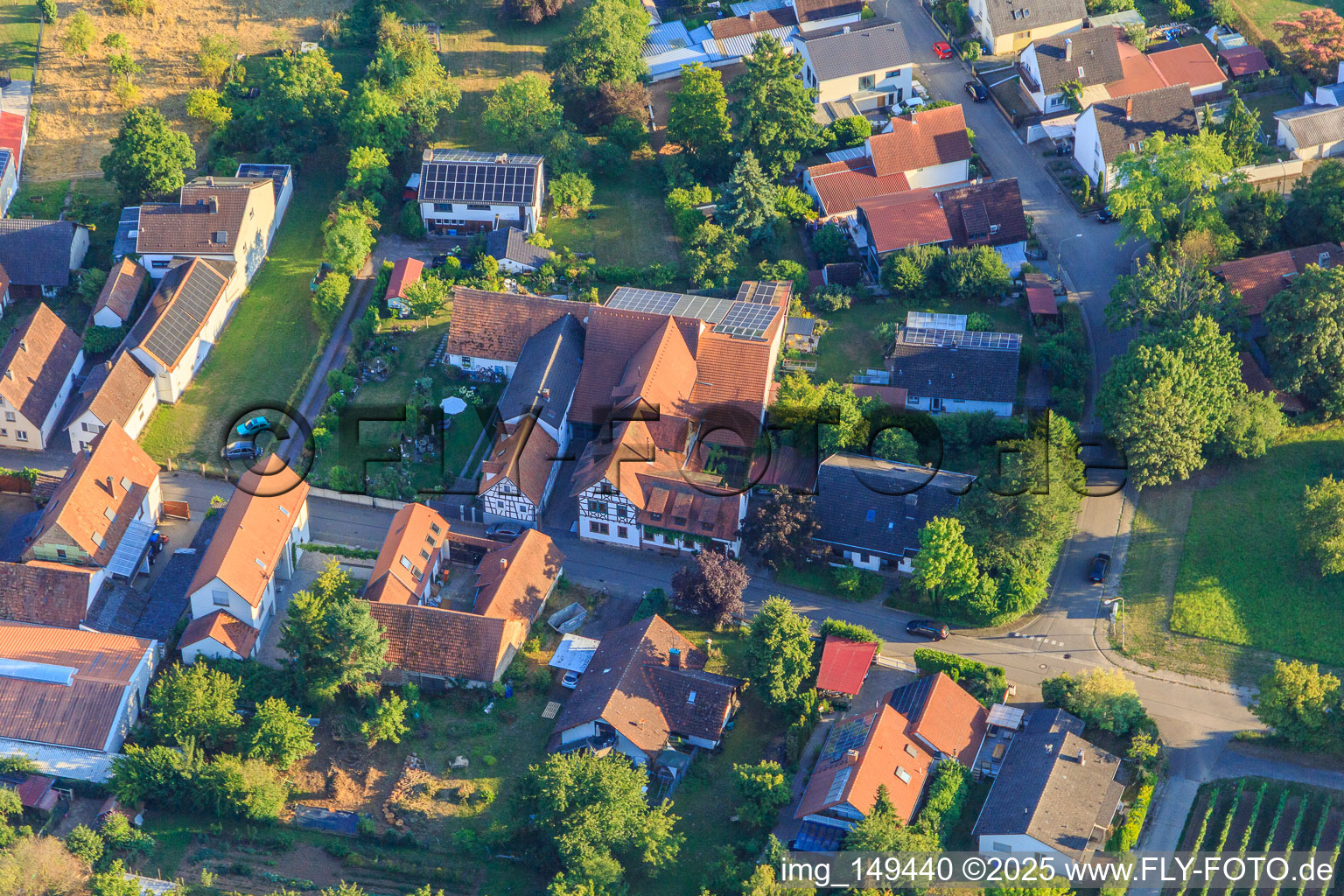 Winery and Wine Bar Vogler in the district Heuchelheim in Heuchelheim-Klingen in the state Rhineland-Palatinate, Germany from the plane