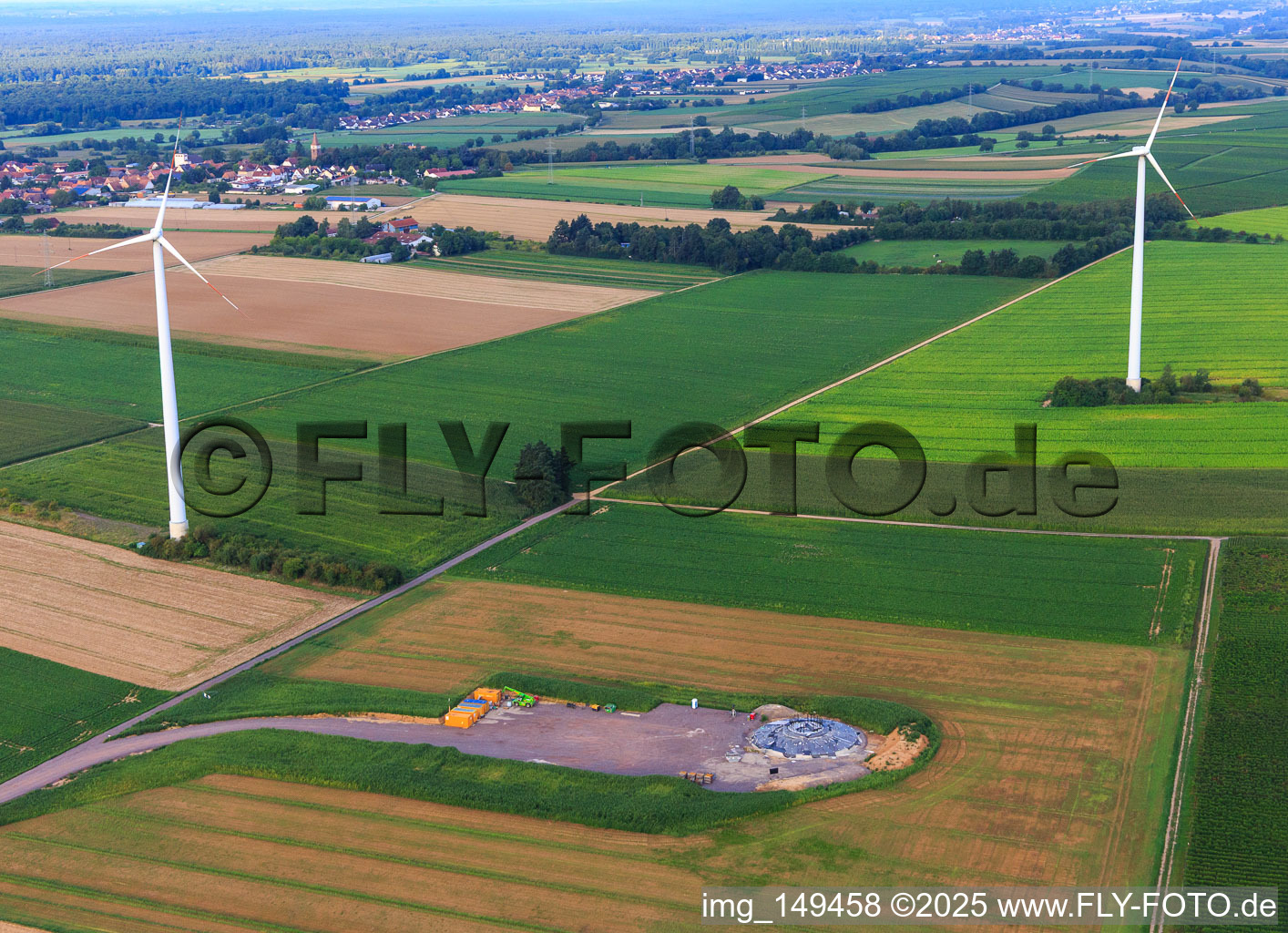 Repowering Wind Farm Minfeld. JUWI replaces four old turbines (GE 1.5) from 2004 with two new, modern Vestas V162 turbines, each with six megawatts. in Minfeld in the state Rhineland-Palatinate, Germany out of the air