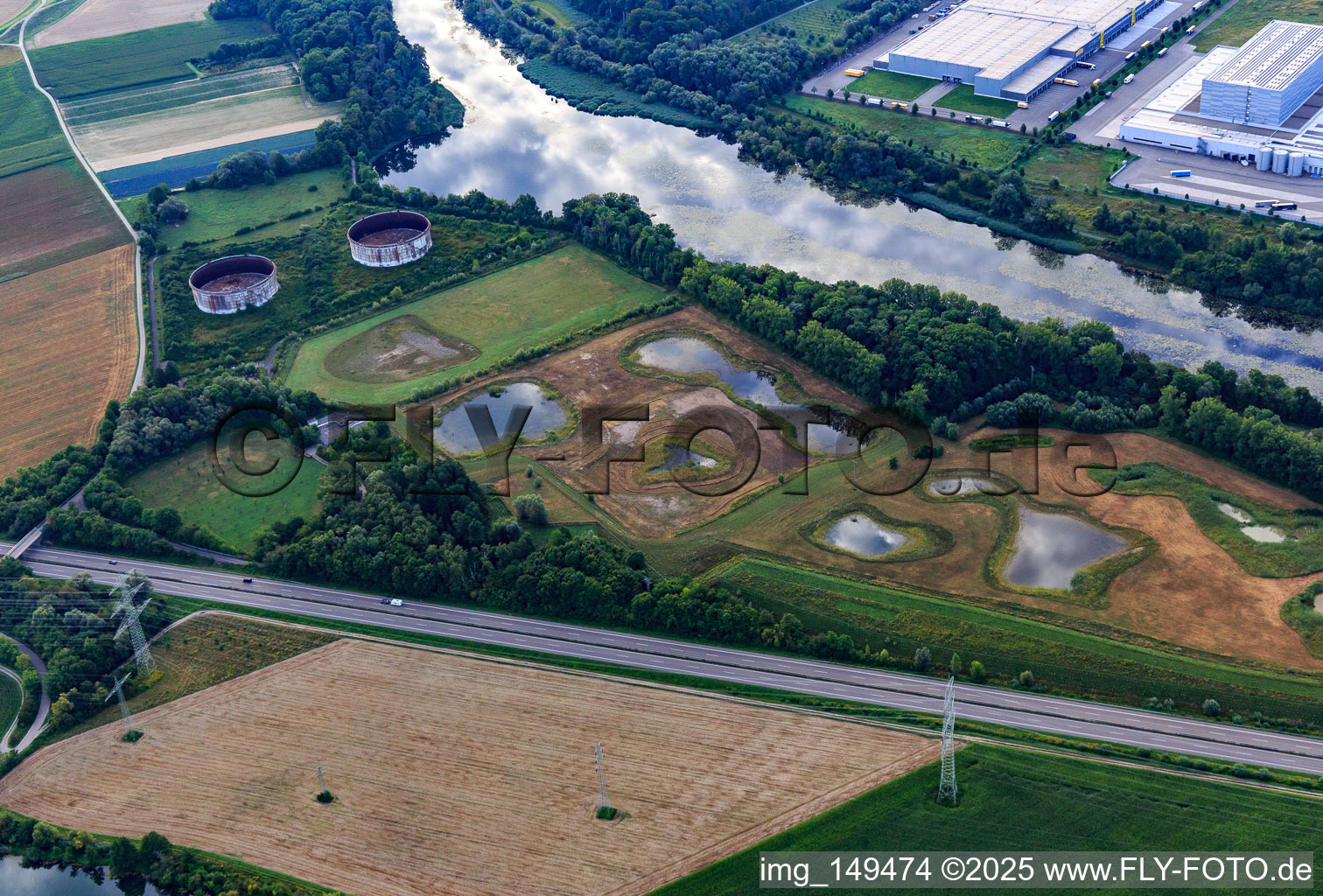 Renaturalized tank farm Jockgrim and two rusting tanks of TANQUID on the Old Rhine in Jockgrim in the state Rhineland-Palatinate, Germany