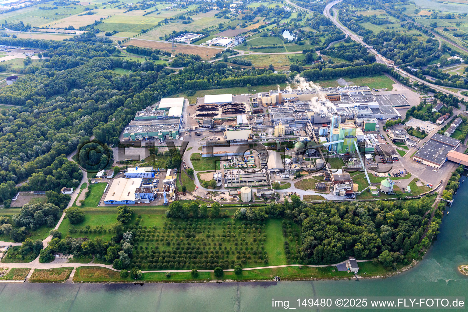 Maxauer Papierfabrik GmbH on the banks of the Rhine from the west in the district Knielingen in Karlsruhe in the state Baden-Wuerttemberg, Germany