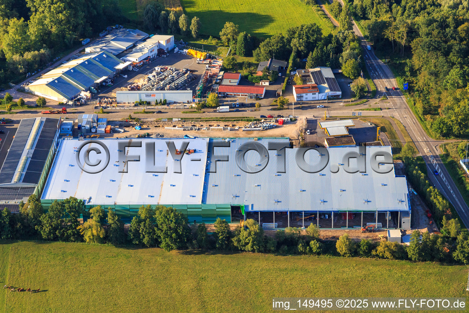 Construction site for the new logistics park of HANSAINVEST and DFI-Real-Estate Kandel after demolition of the OBI market in the district Minderslachen in Kandel in the state Rhineland-Palatinate, Germany from the plane