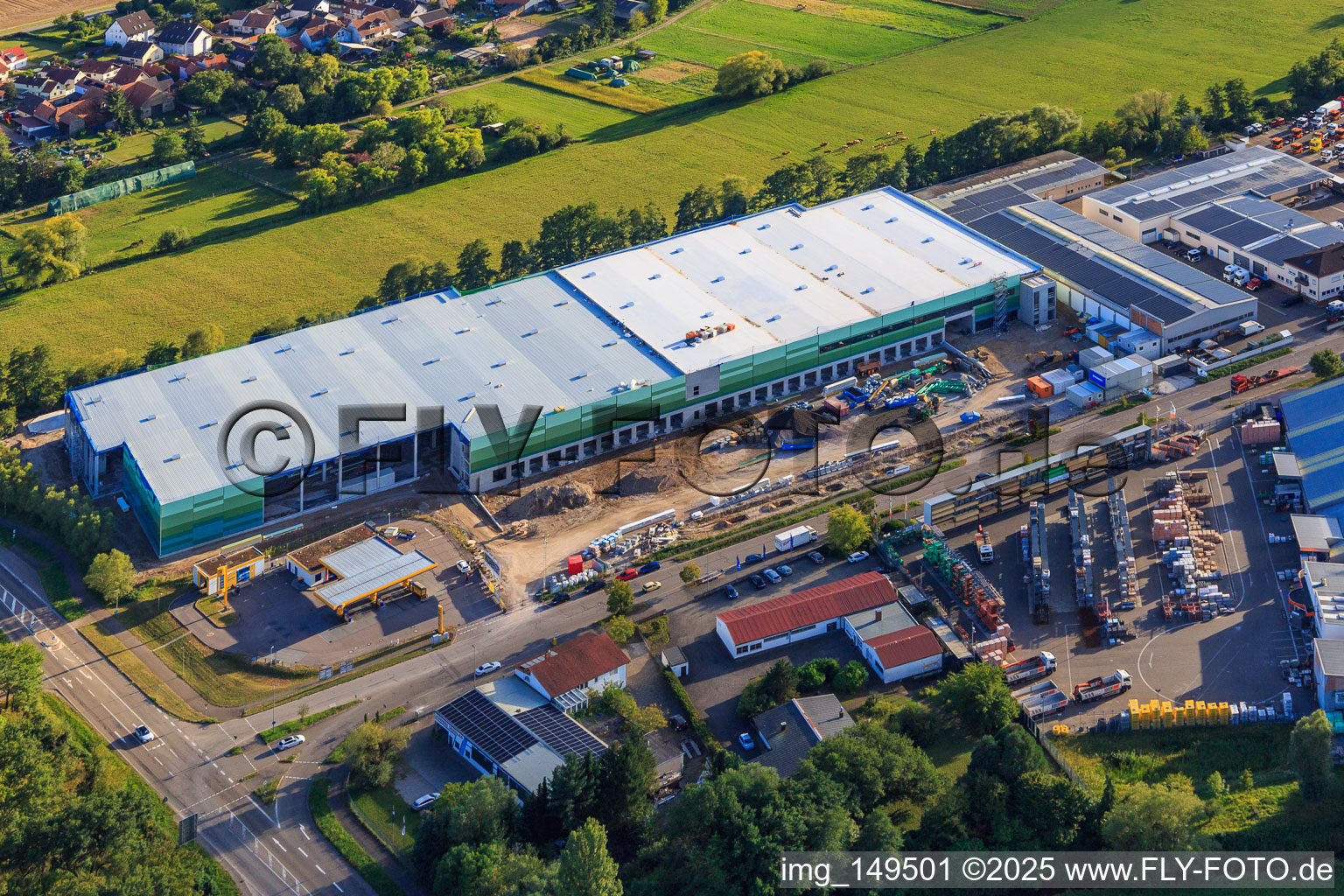 Drone image of Construction site for the new logistics park of HANSAINVEST and DFI-Real-Estate Kandel after demolition of the OBI market in the district Minderslachen in Kandel in the state Rhineland-Palatinate, Germany