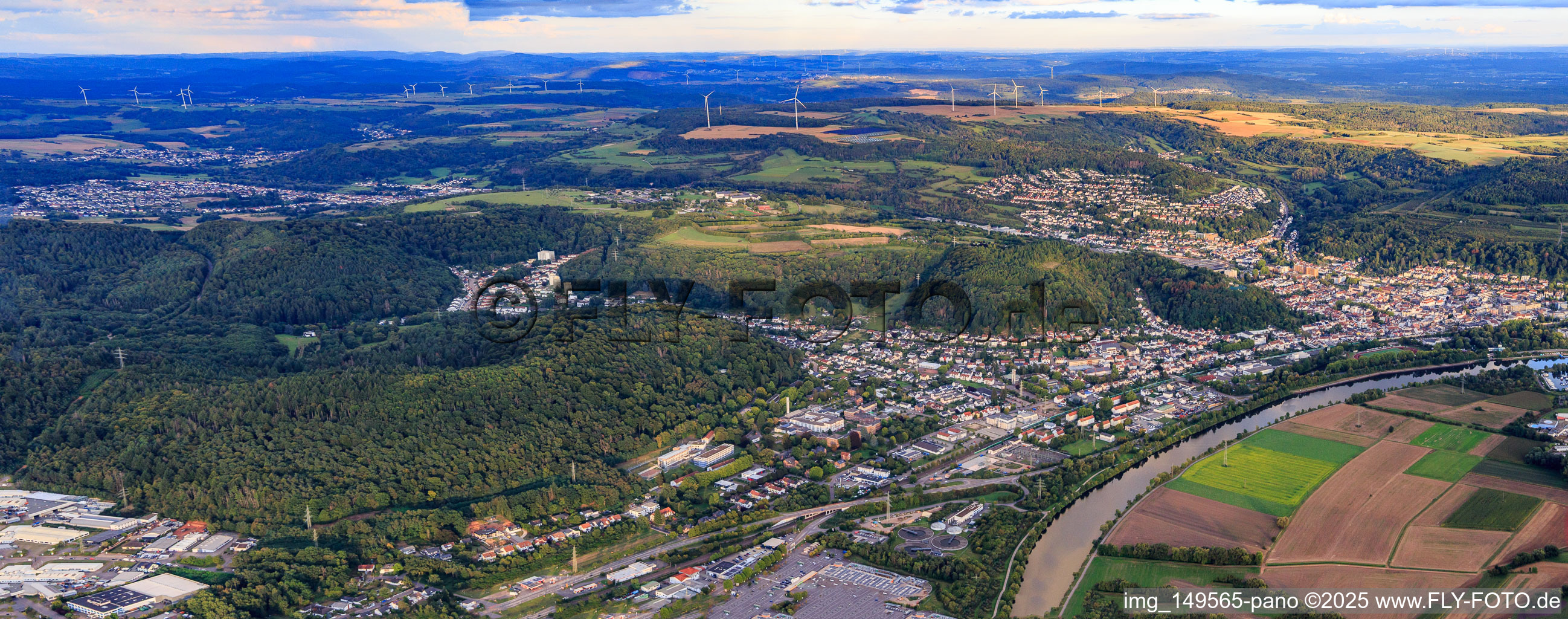City panorama on the banks of the Saar from the northwest in Merzig in the state Saarland, Germany