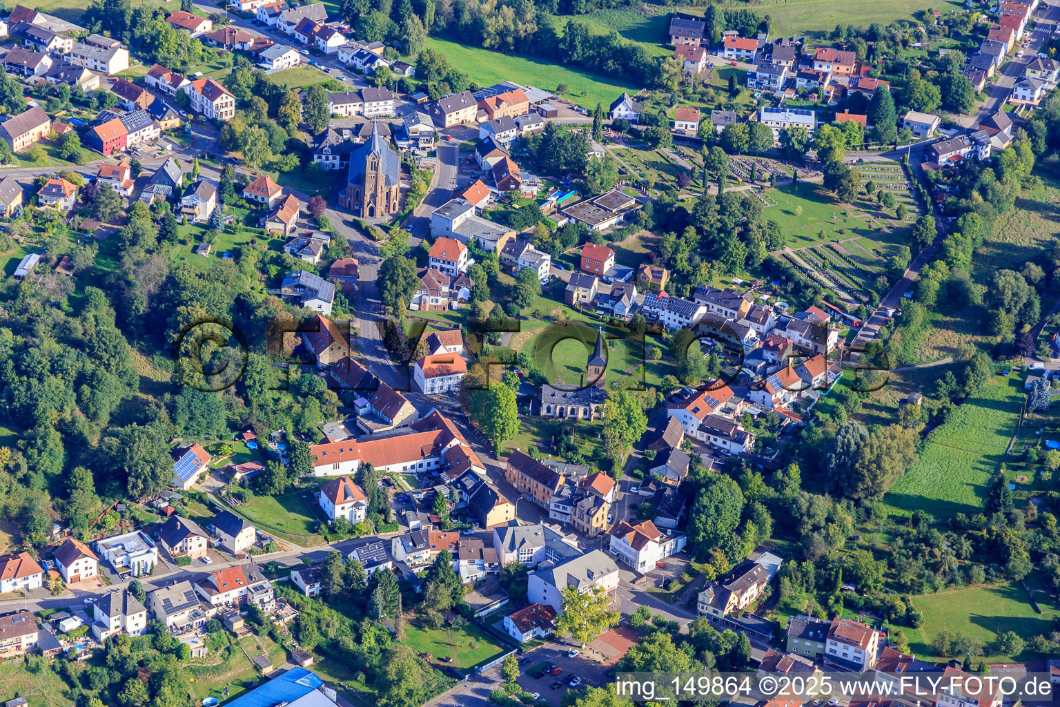 Sacred Heart Church and Evangelical St. Martin's Church in the district Kölln in Püttlingen in the state Saarland, Germany