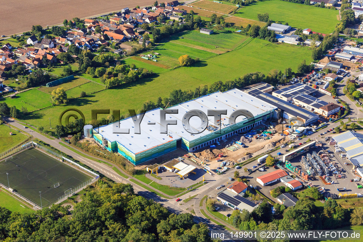 Drone image of Construction site of the new logistics park of HANSAINVEST and DFI-Real-Estate Kandel after demolition of the OBI market in the district Minderslachen in Kandel in the state Rhineland-Palatinate, Germany