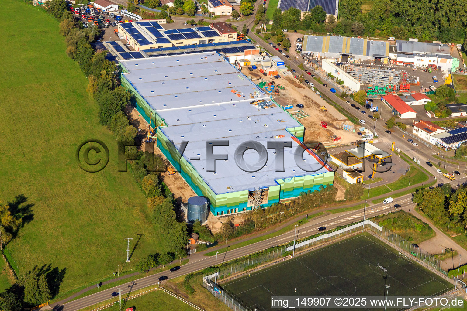 Construction site of the new logistics park of HANSAINVEST and DFI-Real-Estate Kandel after demolition of the OBI market in the district Minderslachen in Kandel in the state Rhineland-Palatinate, Germany seen from a drone