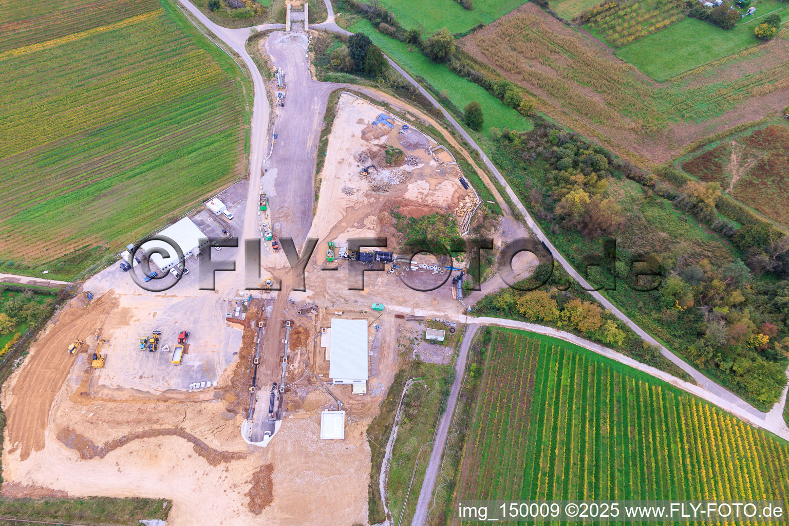 Construction site of the eastern tunnel portal for the Astrid Tunnel for the underpass and bypass of Bad Bergzabern between B38 (Weinstraße) and B427 (Kurtalstraße) in Dörrenbach in the state Rhineland-Palatinate, Germany from above